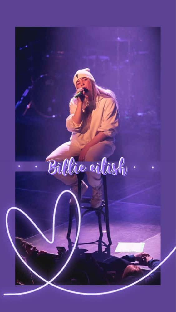 愛心 桌布 壁紙 — Billie Eilish 身穿白色服裝，在紫色燈光下表演，並帶有霓虹心形圖案疊加效果。
