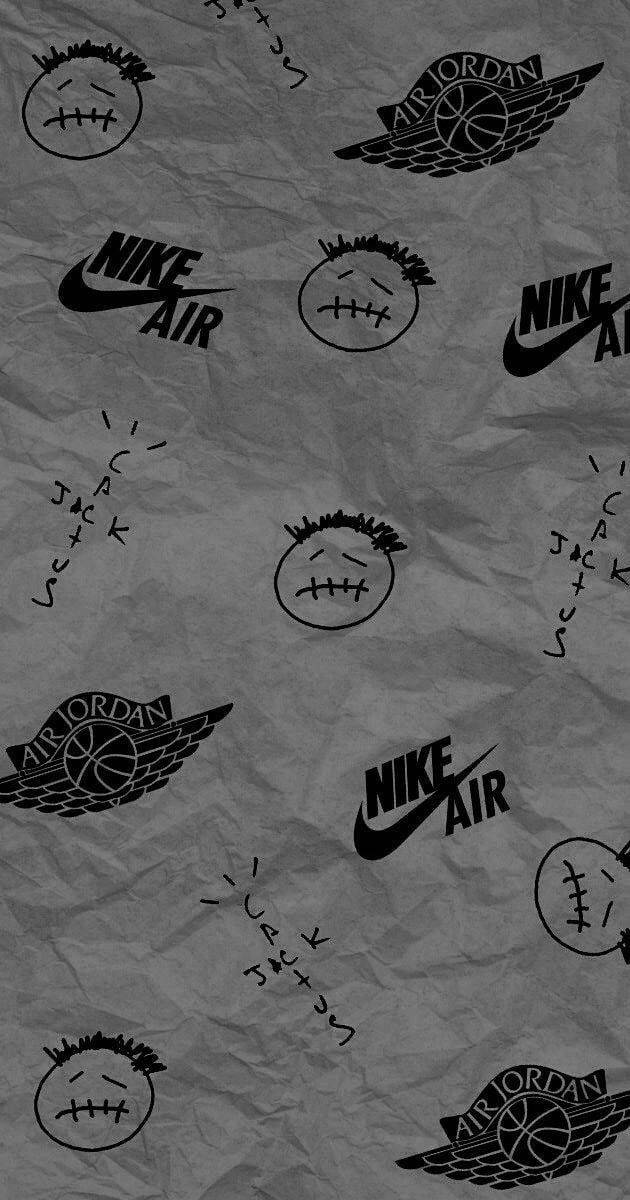皺灰色紙張，帶有黑色Nike Air Jordan標誌和縫合面孔塗鴉。 — Jordan Logo 壁紙