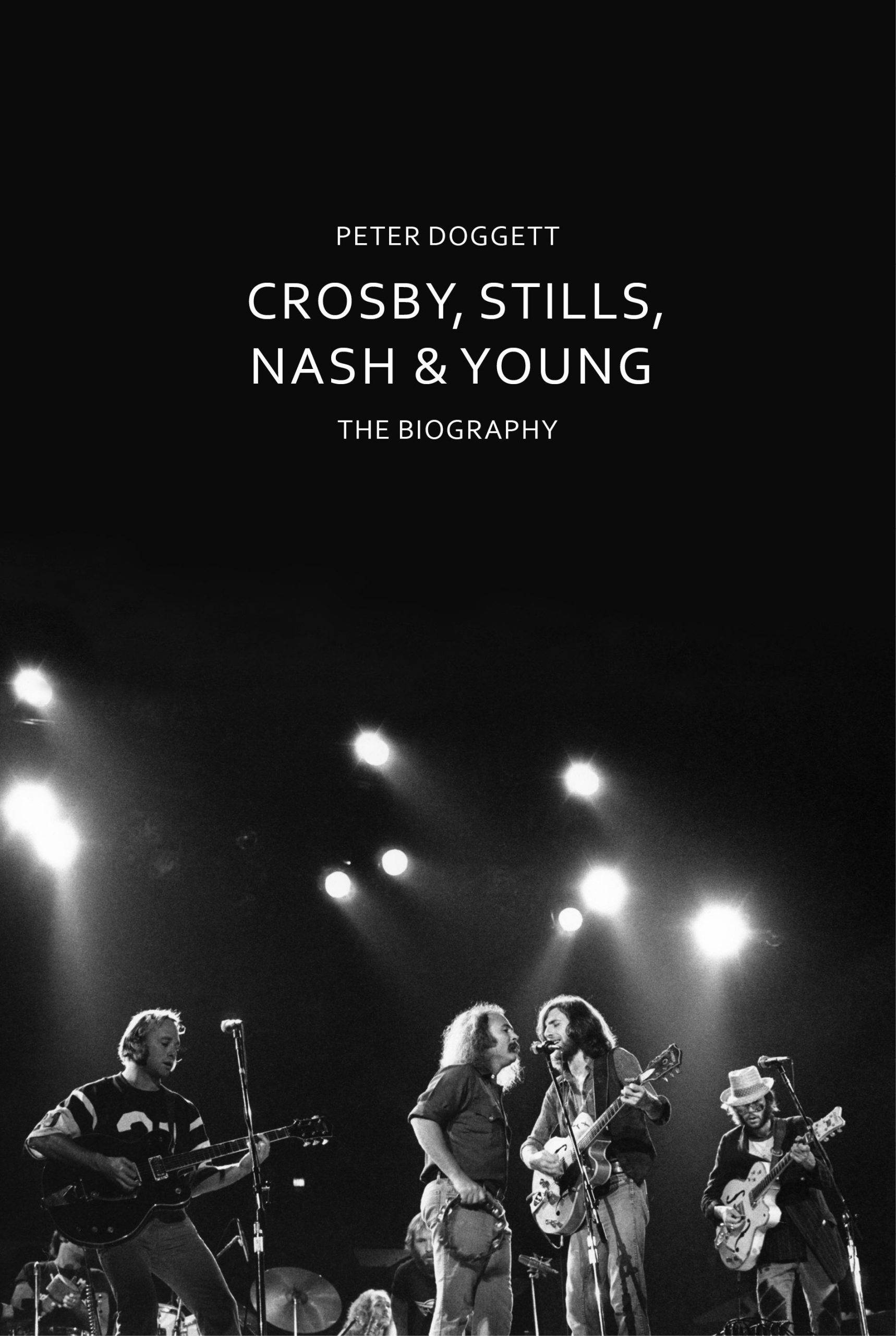 黑白 桌布 壁紙 — Crosby Stills Nash & Young 在明亮聚光燈下現場表演的黑白照片。