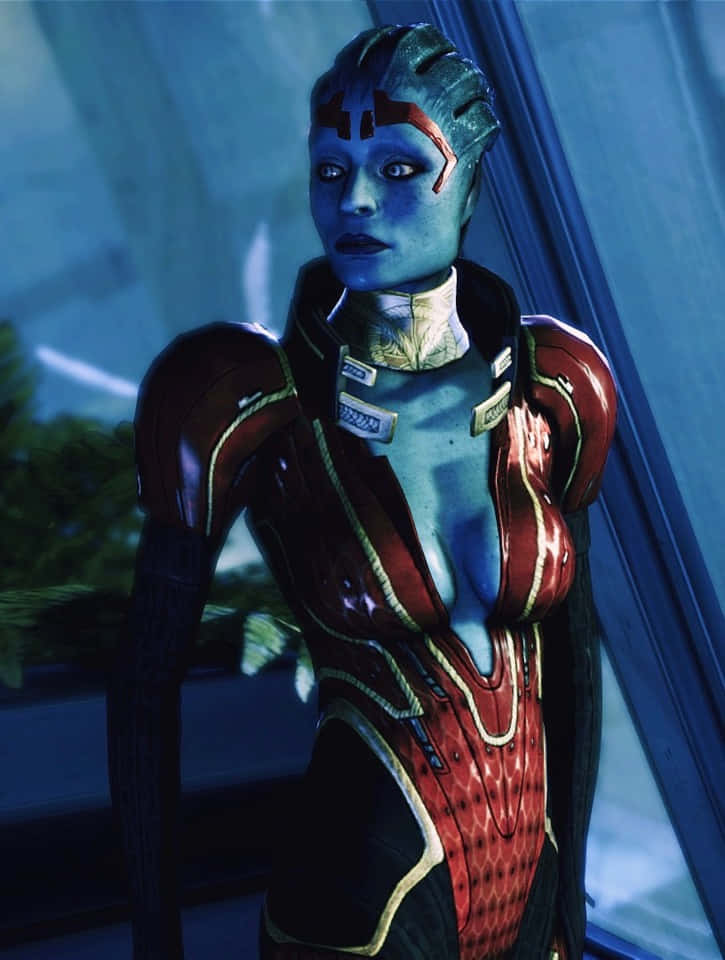 Mass Effect Samara 桌布 壁紙 — 一位藍皮膚的外星女性穿著紅黑裝甲服，站在充滿藍色光芒的未來場景中。