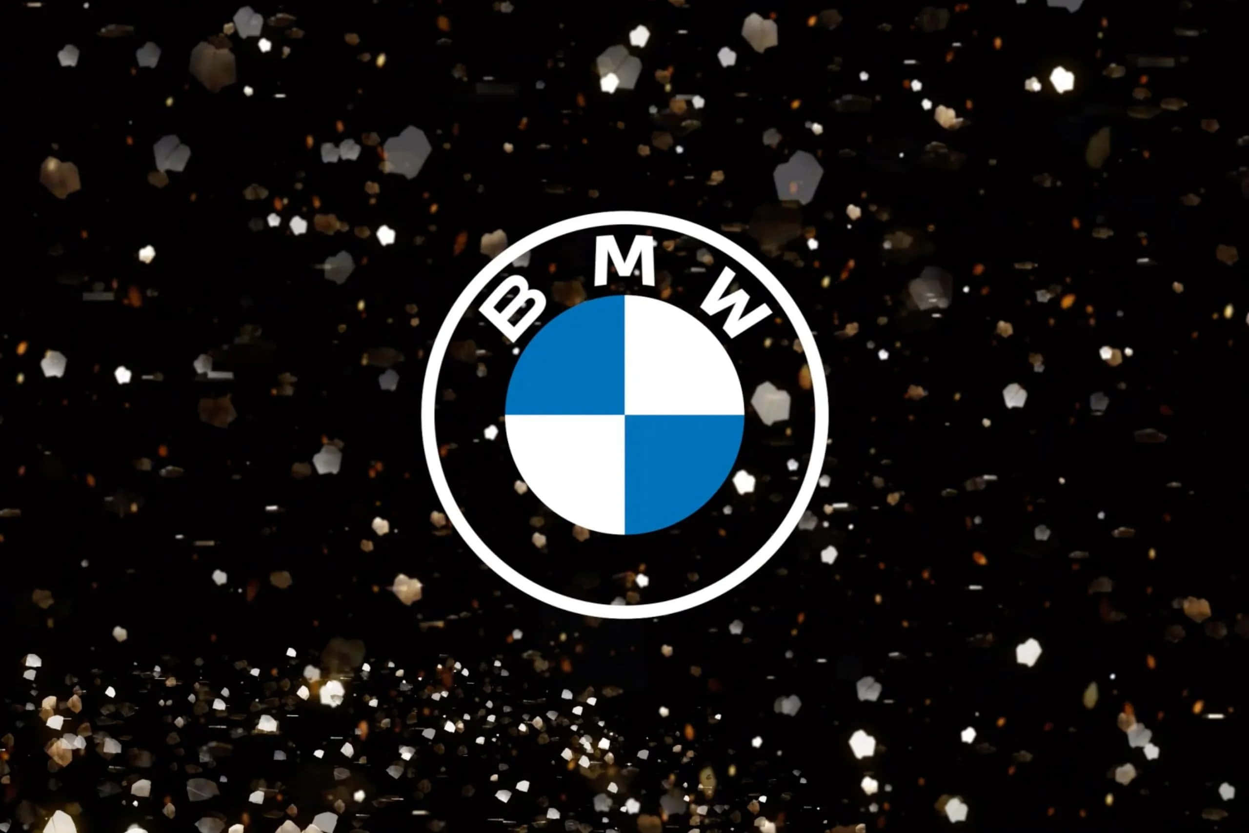 Bmw Logo 桌布 壁紙 — BMW 標誌居中於黑色背景上，帶有閃爍的亮粉粒子。