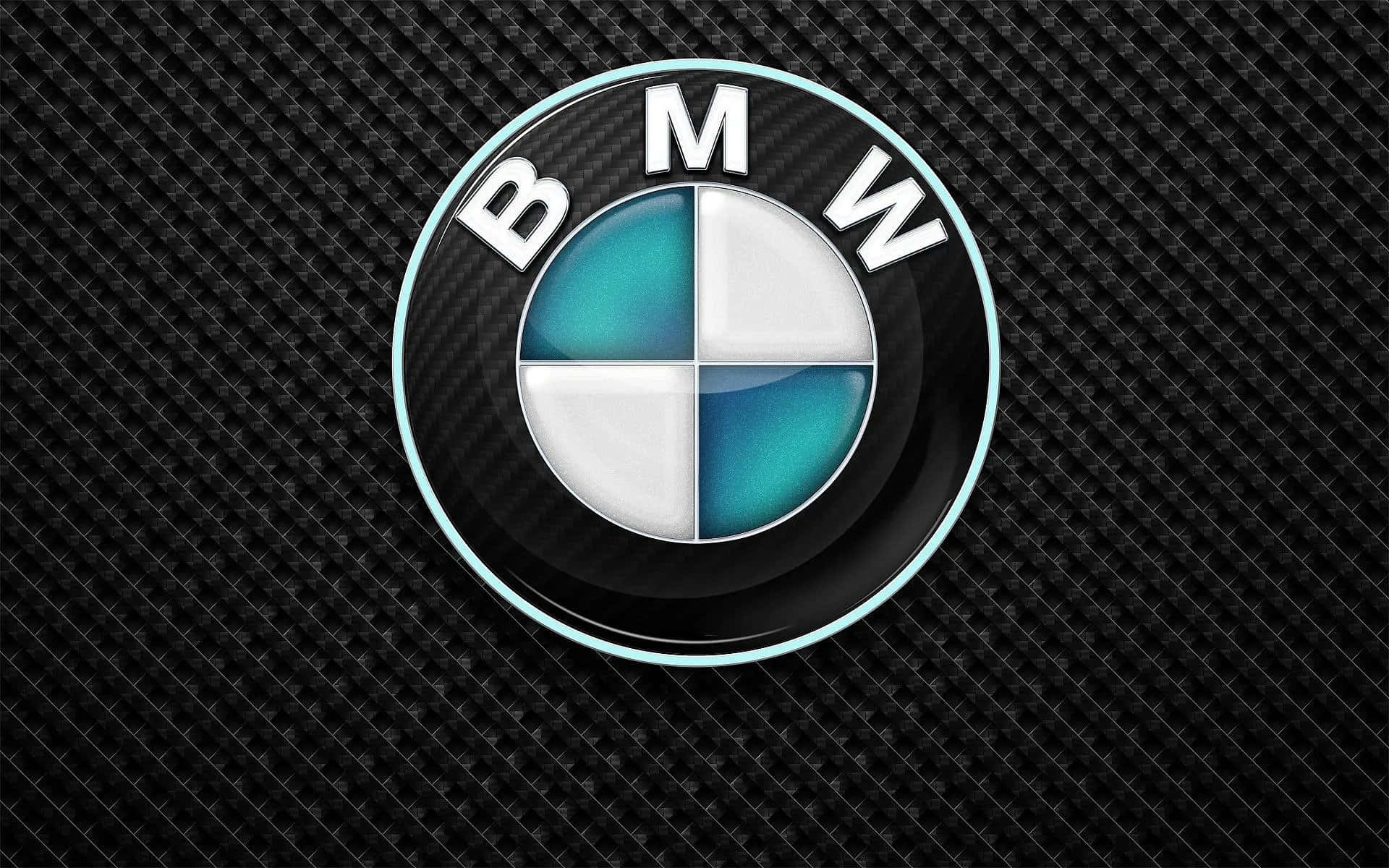 Bmw Logo 桌布 壁紙 — BMW 標誌帶有藍色和白色象限，在紋理黑色碳纖維背景上閃耀。
