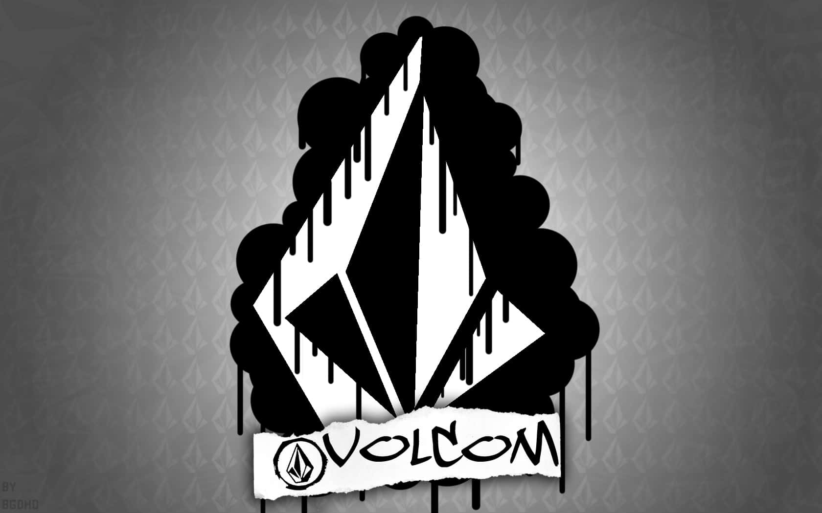  壁紙 — 一個大膽的黑白 Volcom 標誌像油漆一樣滴落在有紋理的灰色背景上。