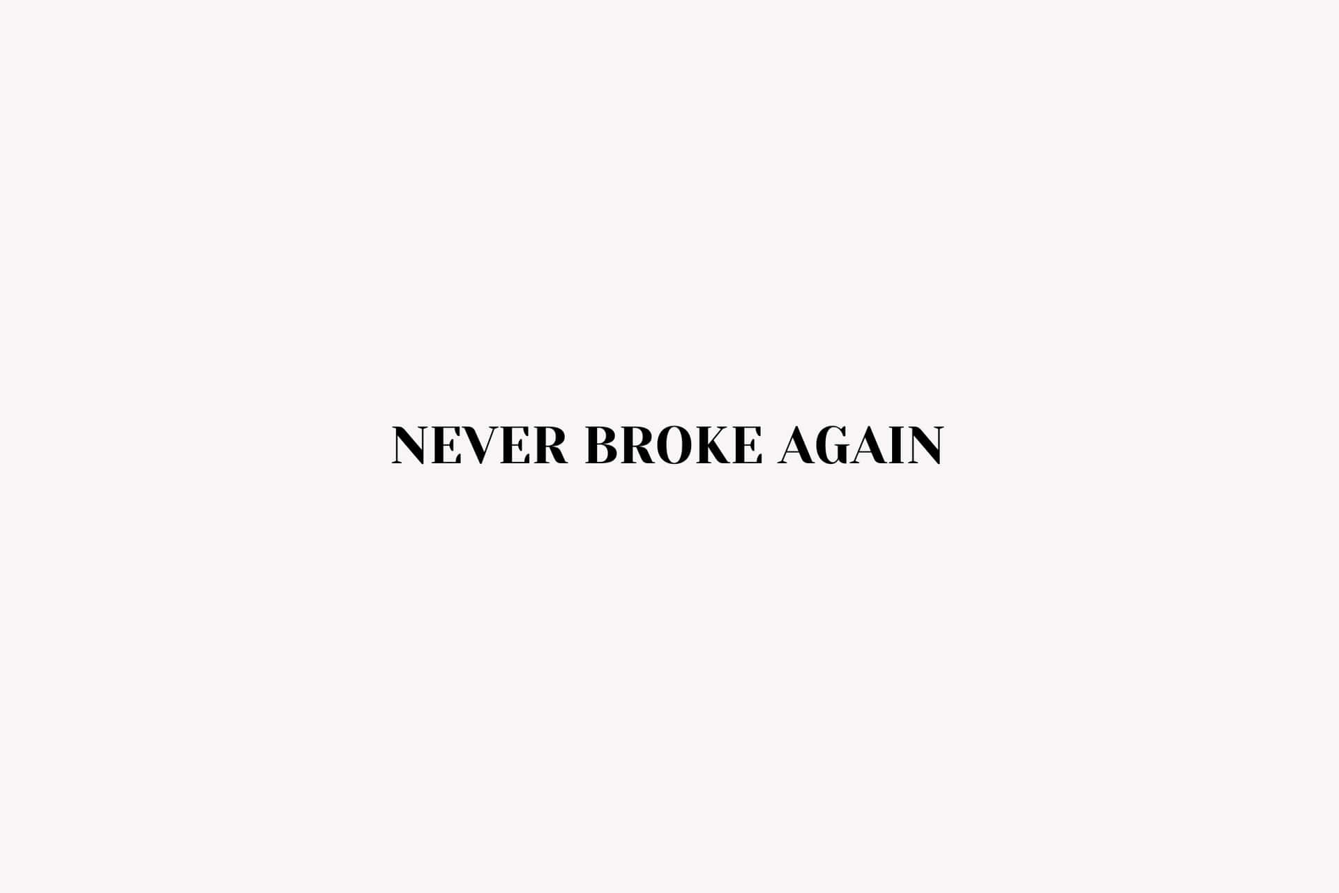  壁紙 — 粗體黑色文字 never broke again 居中顯示在極簡淺灰色背景上。