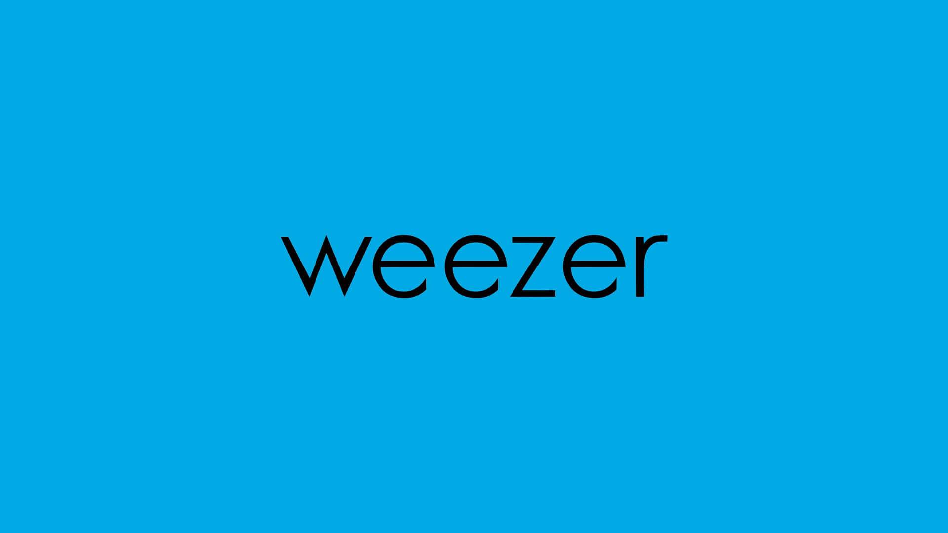  壁紙 — 粗體黑色 'weezer' 文字居中於純亮藍色背景上。
