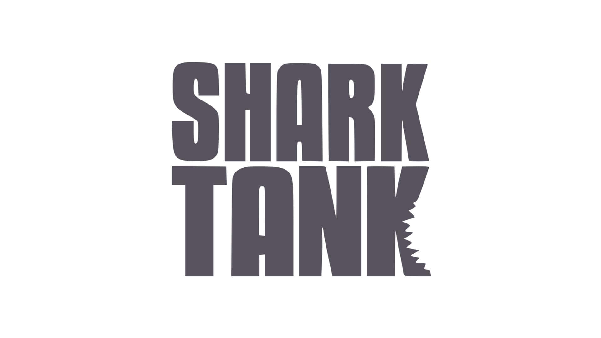  壁紙 — 大膽的灰色 'SHARK TANK' 標誌，'K' 上有鋸齒狀鯊魚鰭，背景為乾淨的白色。