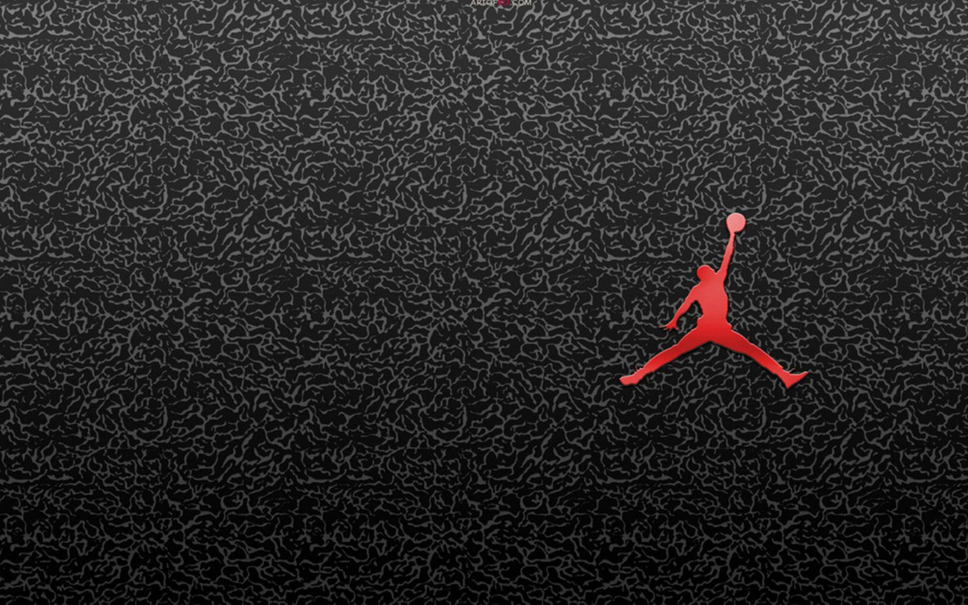 帶紋理黑色背景上的紅色籃球運動員標誌 — Jordan Logo 壁紙