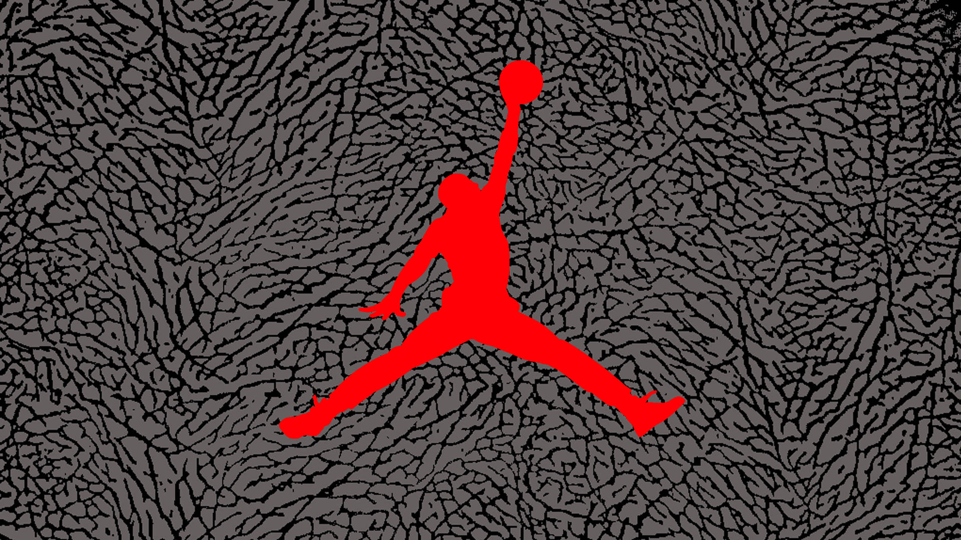 紅色籃球運動員剪影在灰色紋理背景上持球跳躍。 — Air Jordan 壁紙