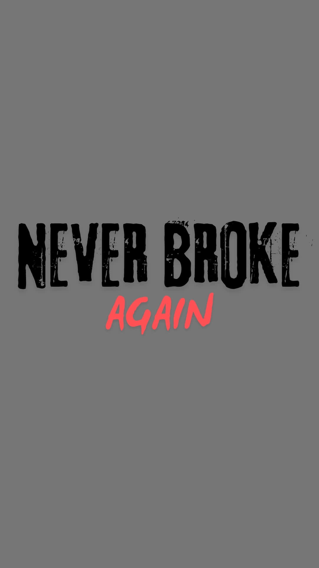  壁紙 — 粗體文字在純灰色背景上以黑色和紅色宣告「NEVER BROKE AGAIN」。