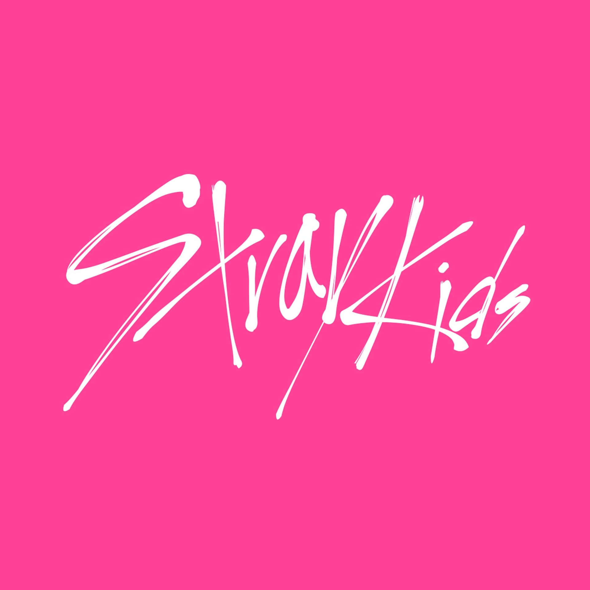  壁紙 — 大膽的白色筆觸文字「StrayKids」居中在充滿活力的粉紅色背景上。