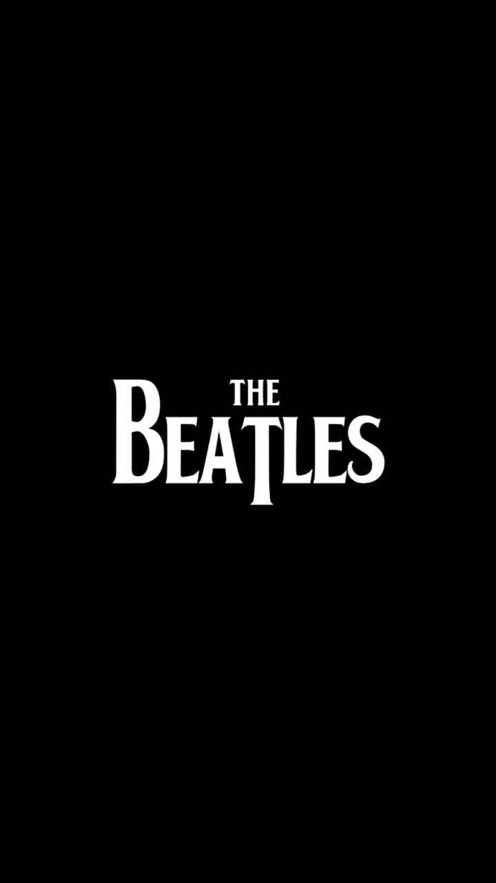  壁紙 — 粗體白色文字拼寫THE BEATLES，居中在純黑色背景上。