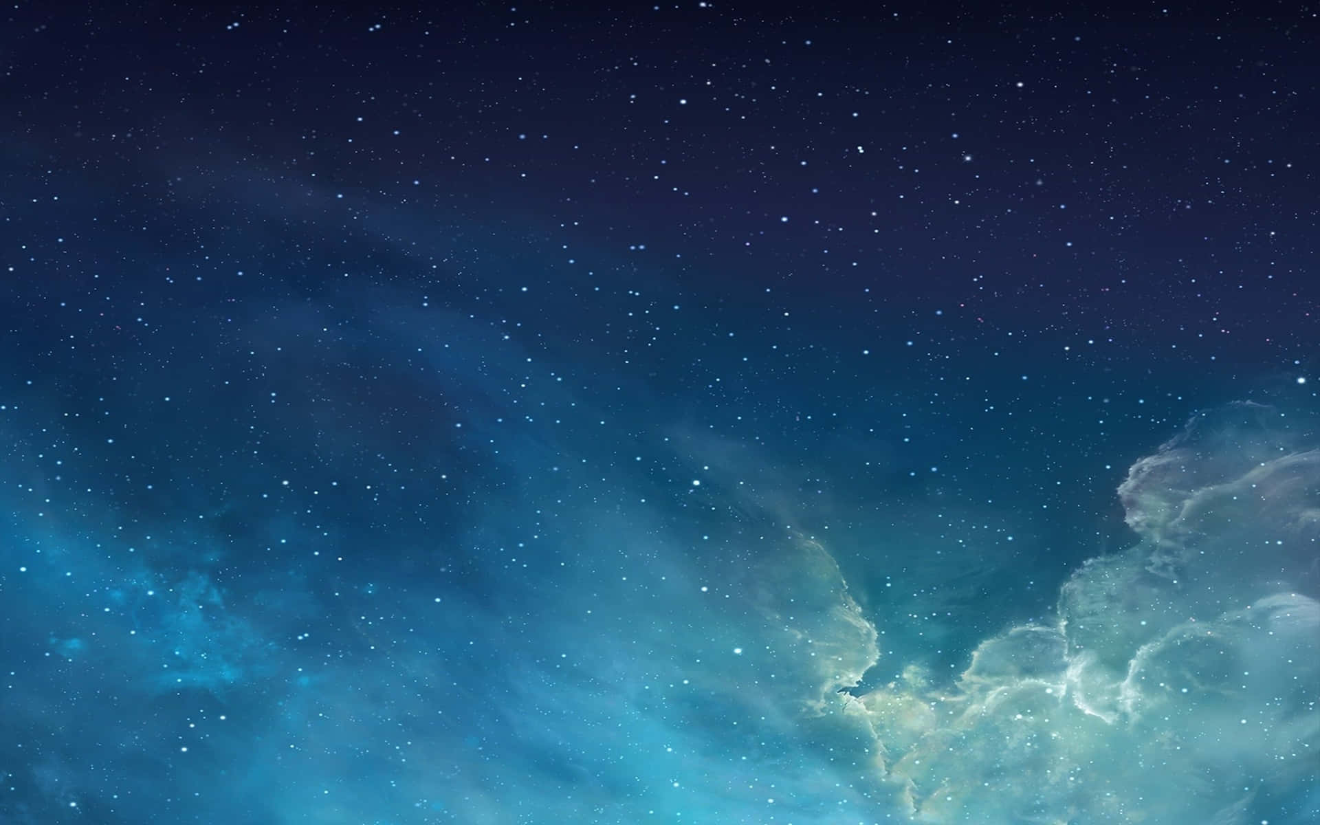  壁紙 — 令人嘆為觀止的星空夜景，閃爍的藍色星雲和縷縷雲霧在宇宙中飄蕩。
