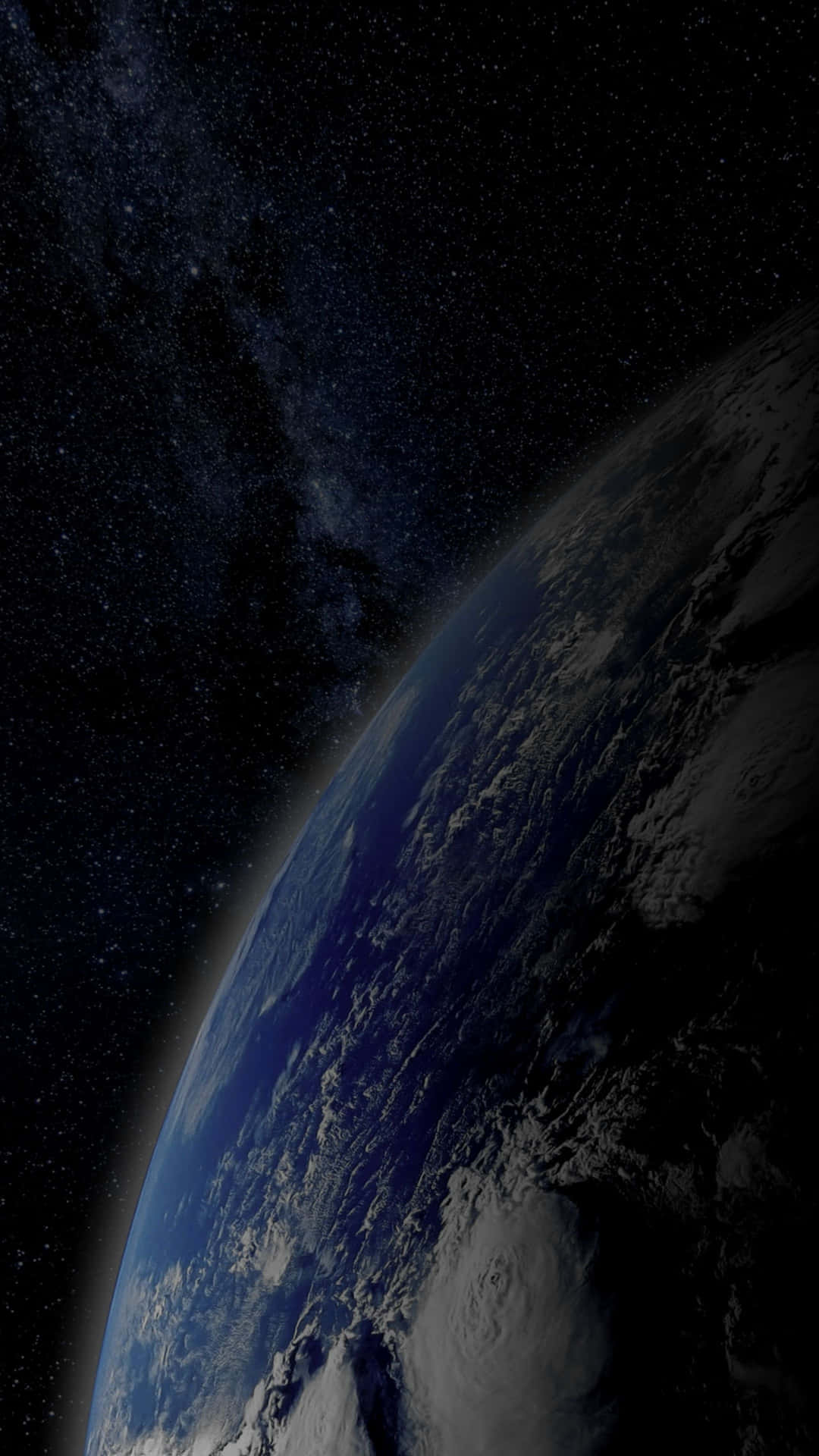  壁紙 — 從太空俯瞰地球的壯麗景色，展現了旋轉的雲層、海洋和上方的銀河系。