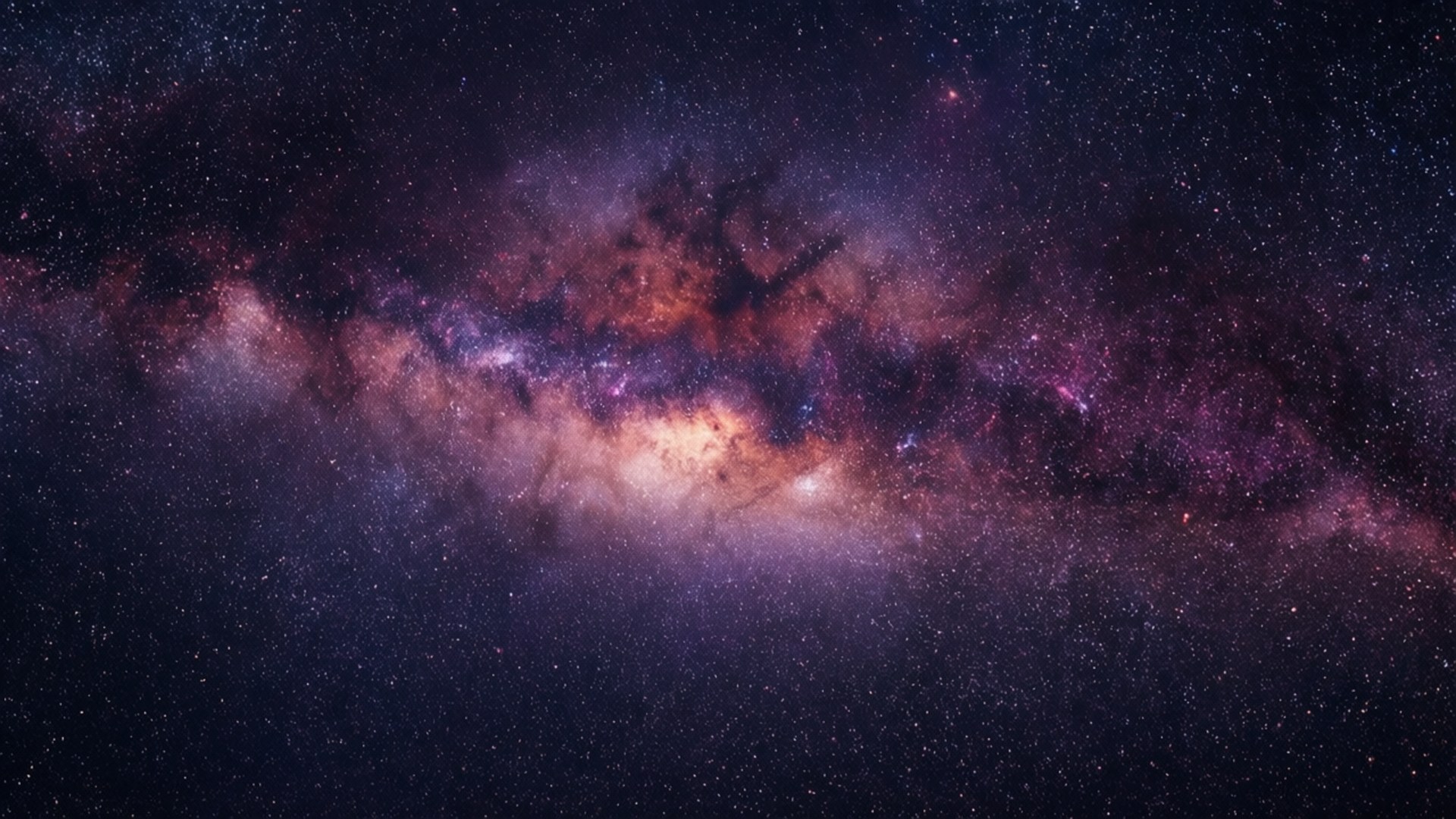 銀河系在黑暗的夜空中呈現出色彩繽紛的星雲和無數的星星 — iPad 壁紙