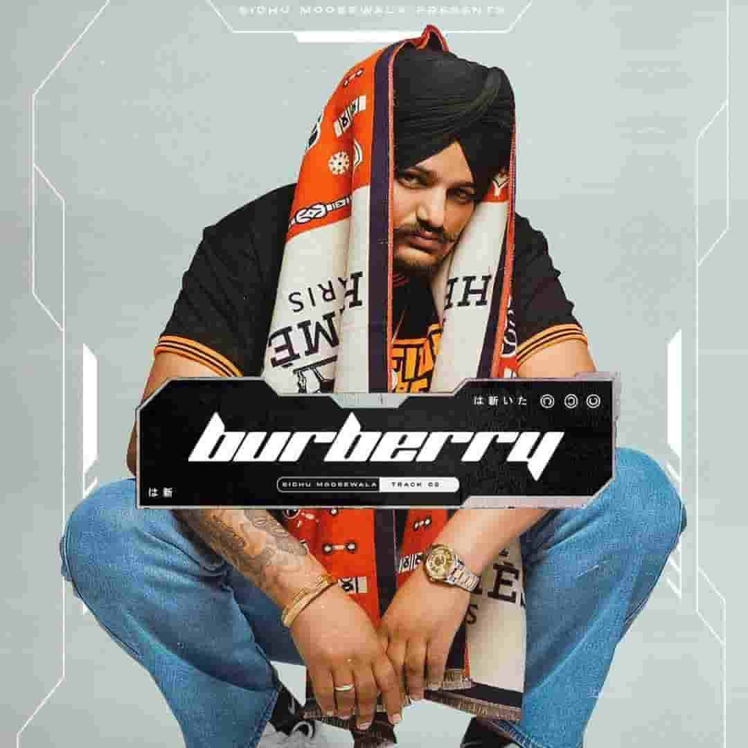 burberry - 一位戴頭巾的男子坐在凳子上