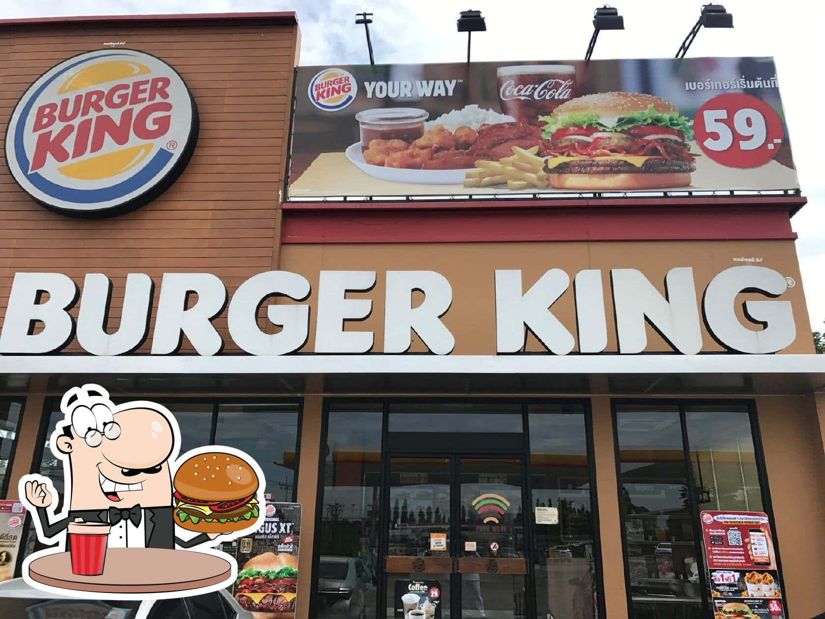 漢堡王 桌布 壁紙 — Burger King 餐廳外觀，設有大型招牌及卡通吉祥物手持漢堡和飲料。