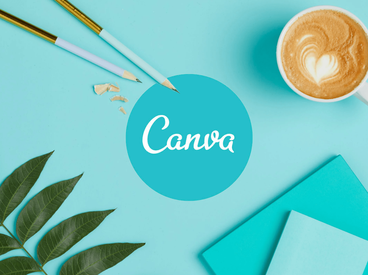 一杯咖啡與一本寫著「canvas」的筆記本 壁紙