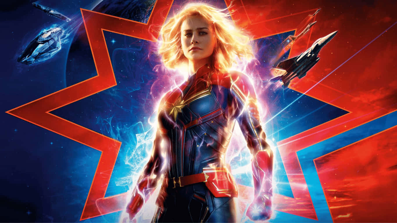 Hero 桌布 壁紙 — Captain Marvel 在一個宇宙環境中英勇地站立，周圍有發光的能量效果和飛行的星艦。