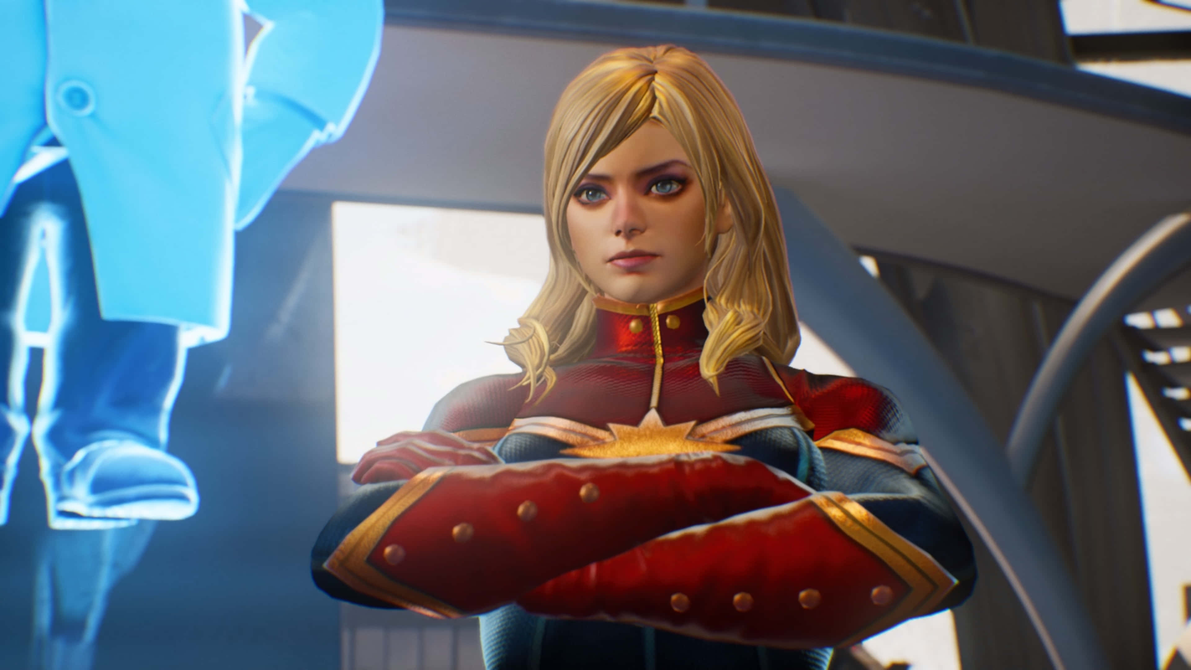 Captain Marvel 3d 桌布 壁紙 — Captain Marvel 自信地交叉雙臂站在未來風格的藍色和銀色房間中。