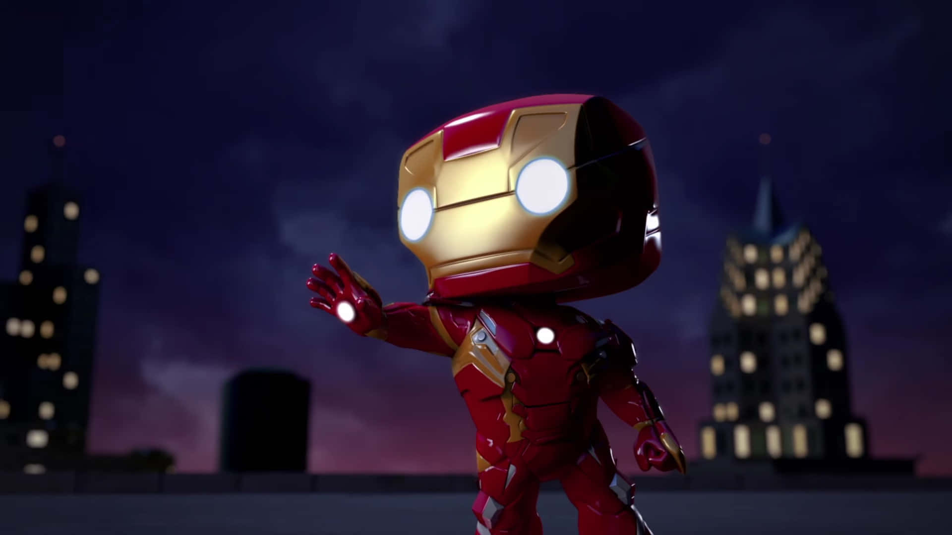 Iron Man Pop Figures 桌布 壁紙 — Chibi Iron Man 夜晚站在屋頂上，發光的眼睛和斥力手對著城市天際線。