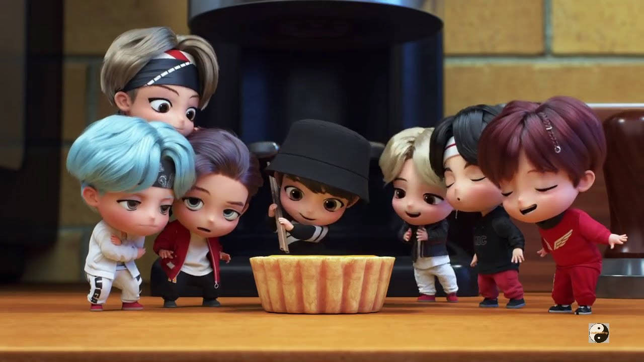 Chibi 動漫角色在室內聚集在一個大蛋糕周圍。 — BTS 卡通 GIF 壁紙