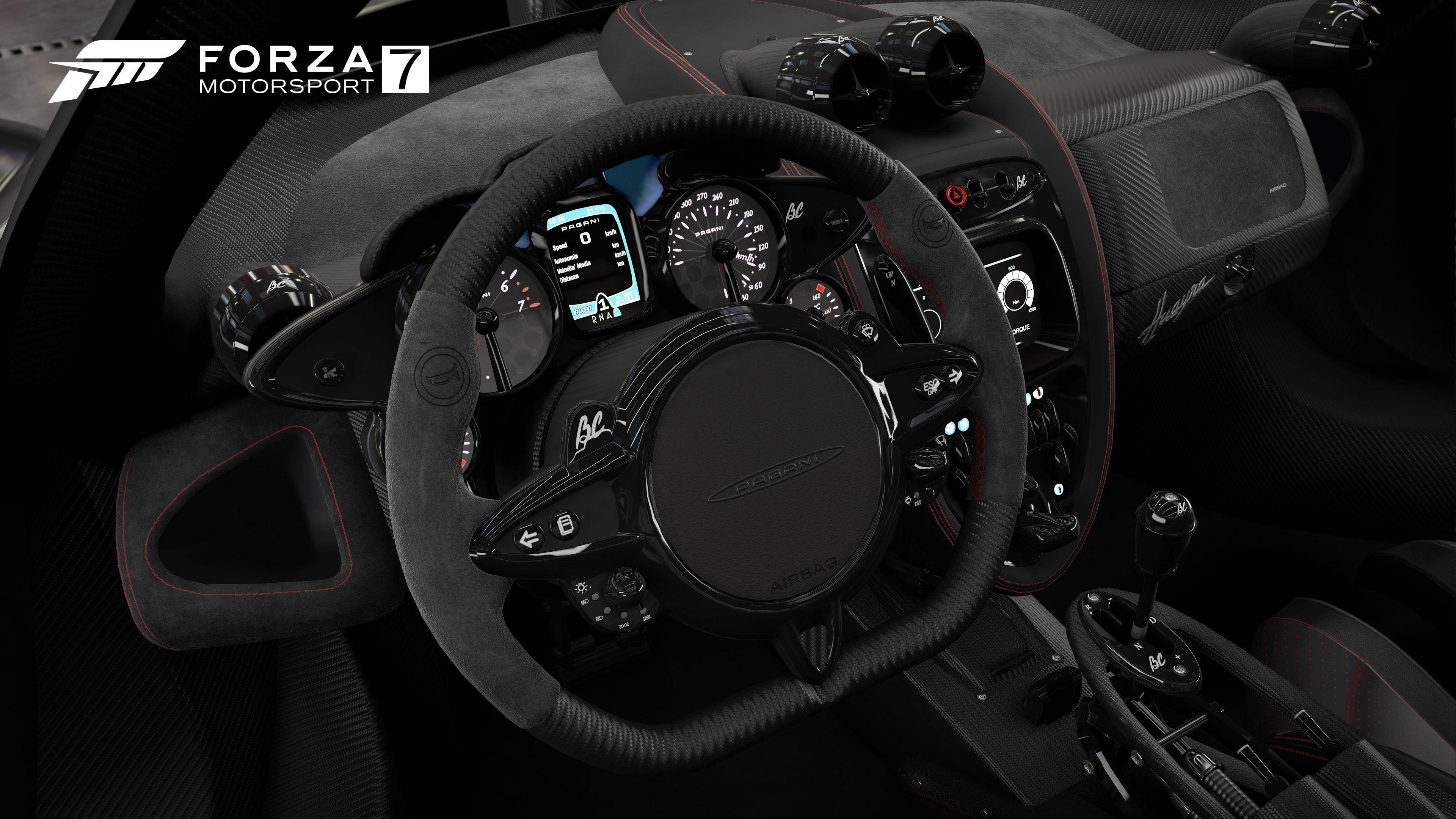 電玩遊戲 桌布 壁紙 — Forza Motorsport 7 中高性能汽車的黑色碳纖維內飾、紅色縫線和數位儀表板特寫。