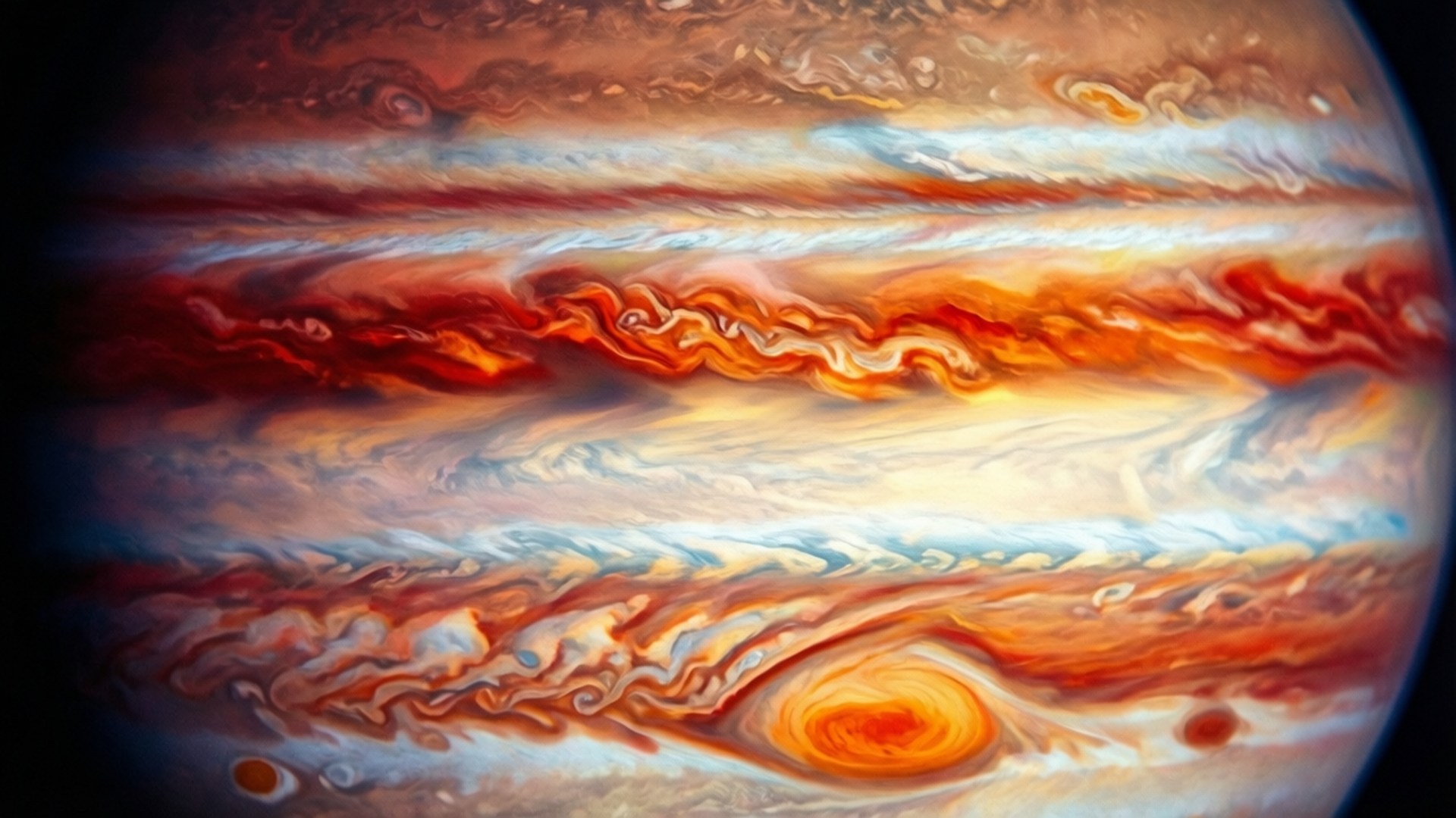 Colorful Cloud Bands 壁紙 — 木星大氣層漩渦帶的近距離視圖，呈現鮮明的紅橙色和白色色調，並有一個突出的眼狀風暴。