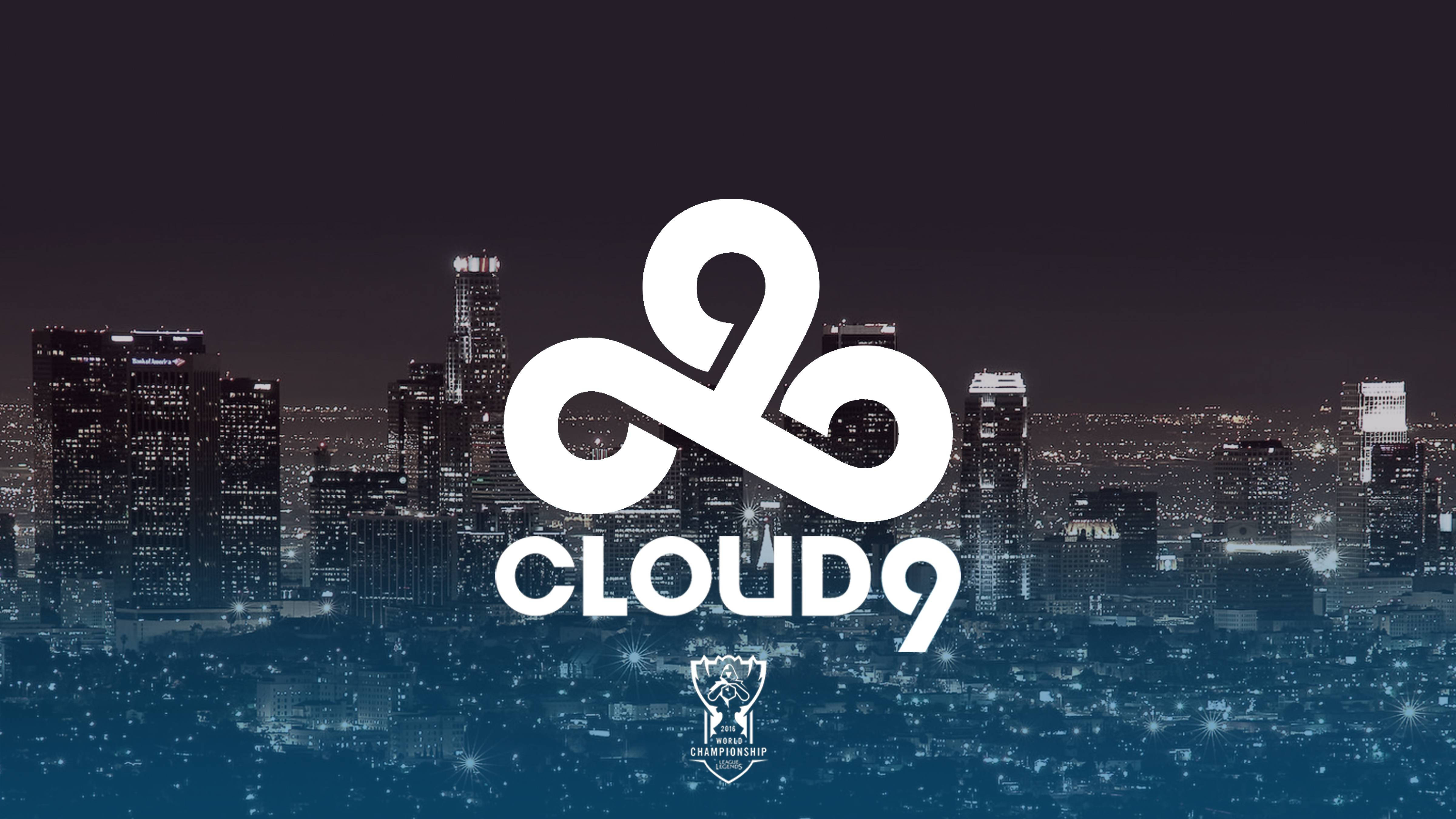 Cloud9 桌布 壁紙 — Cloud9 esports 標誌突出顯示在發光的夜間城市景觀和照亮摩天大樓之上。