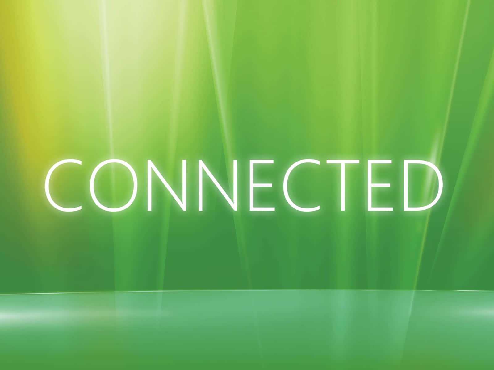 漸層 桌布 壁紙 — 「connected」一詞在充滿活力的綠色漸變背景上發出白色光芒，並帶有耀眼的光線條紋。
