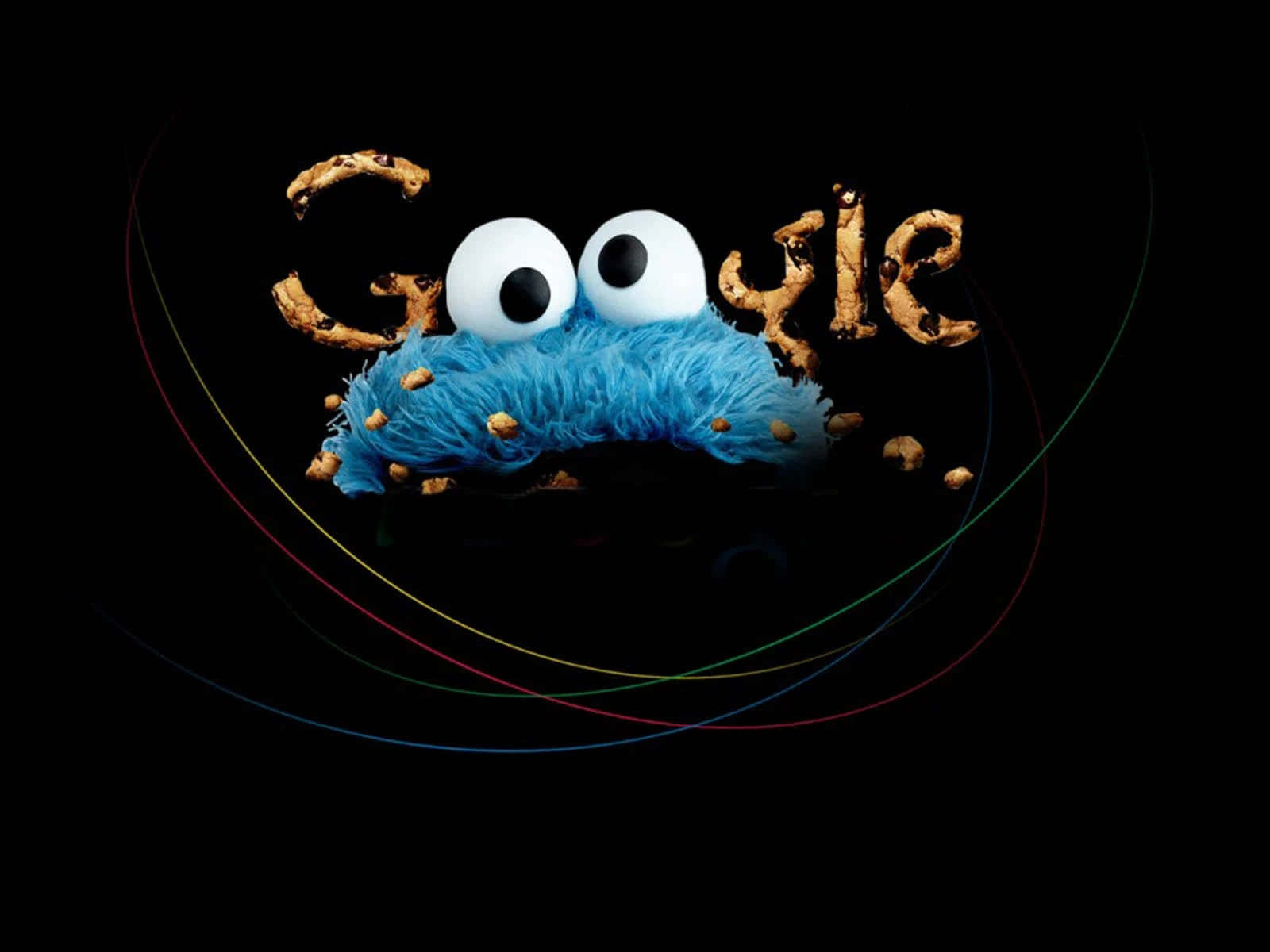 Cookie Monster 與巧克力餅乾碎屑在黑色背景上，帶有彩色弧線。 — Google 壁紙