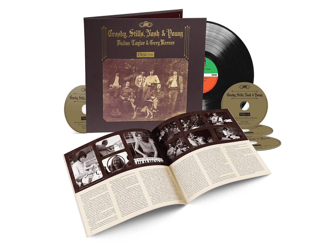 音樂 桌布 壁紙 — Crosby Stills Nash & Young 的復古豪華黑膠唱片盒裝，包含一張復古色調的樂團照片、打開的小冊子（內有黑白照片和文字），以及多張唱片，背景為純白色。
