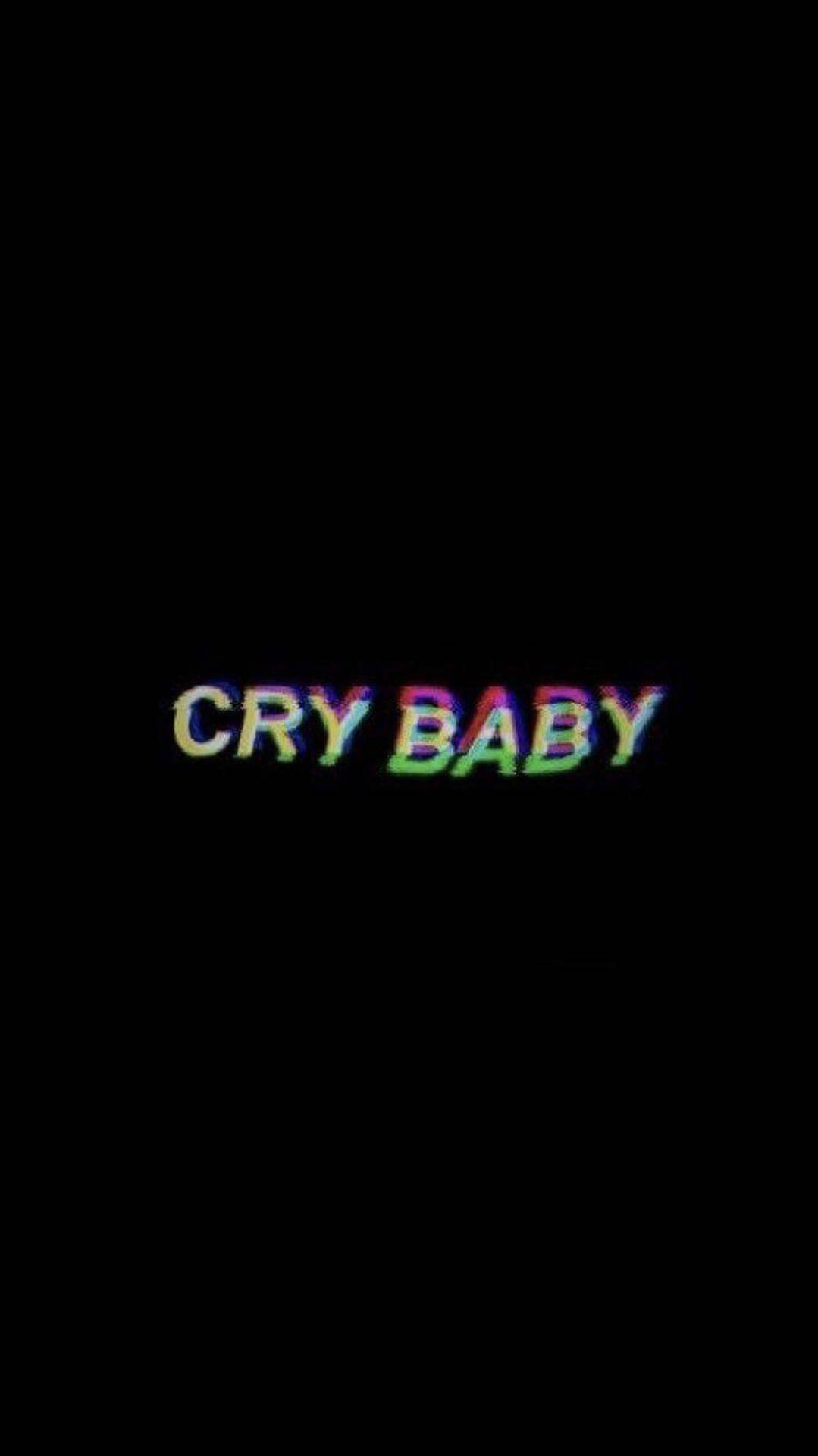 在黑色背景上寫著 cry baby 的 glitchy 彩虹文字