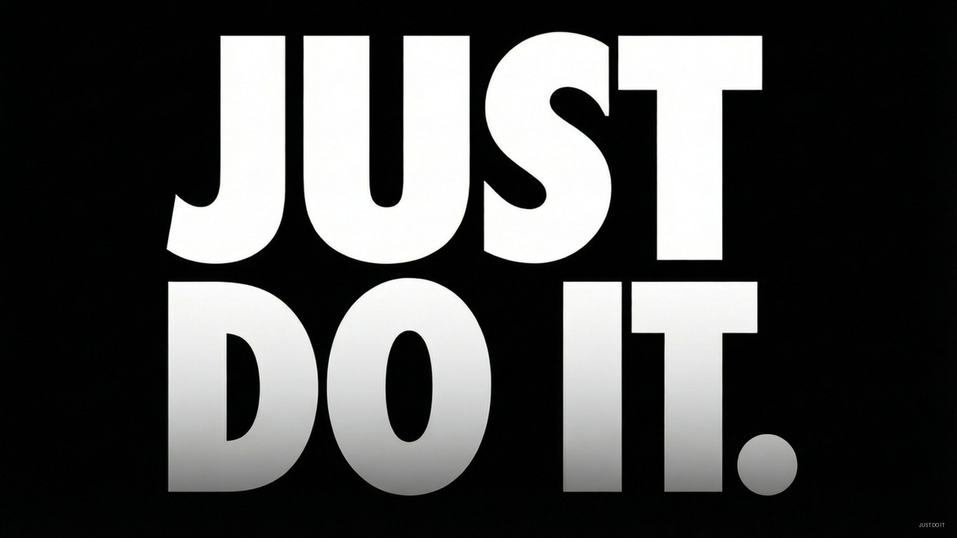 Just Do It Bold 壁紙 — 粗體白色文字寫著 JUST DO IT.，在純黑色背景上顯得格外突出。
