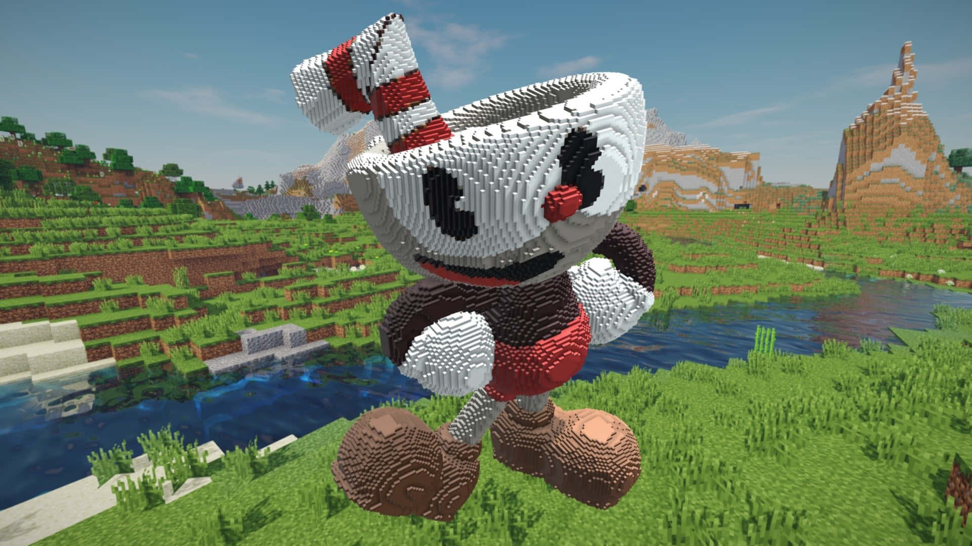 茶杯頭 桌布 壁紙 — Cuphead 站在一個有方塊山丘、河流和像素化天空的Minecraft景觀中。