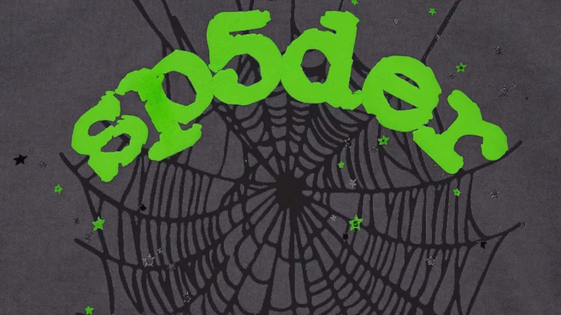  壁紙 — 深灰色布料上，粗體綠色「sp05der」文字拱形排列於黑色蜘蛛網之上，並散落著綠色和黑色的星星。