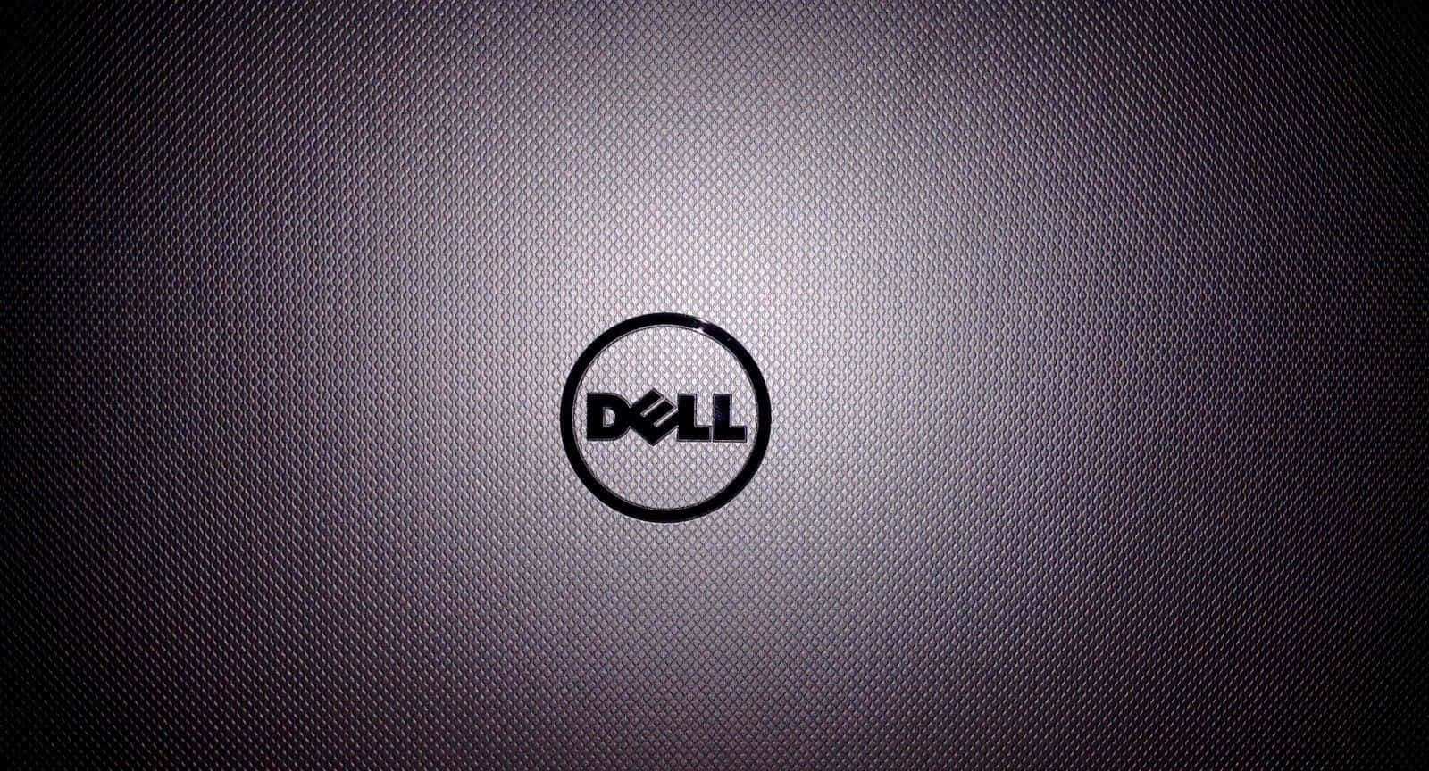 Dell 桌布 壁紙 — Dell 標誌居中於帶有紋理的深灰色表面上，並帶有柔和的徑向光線漸變。