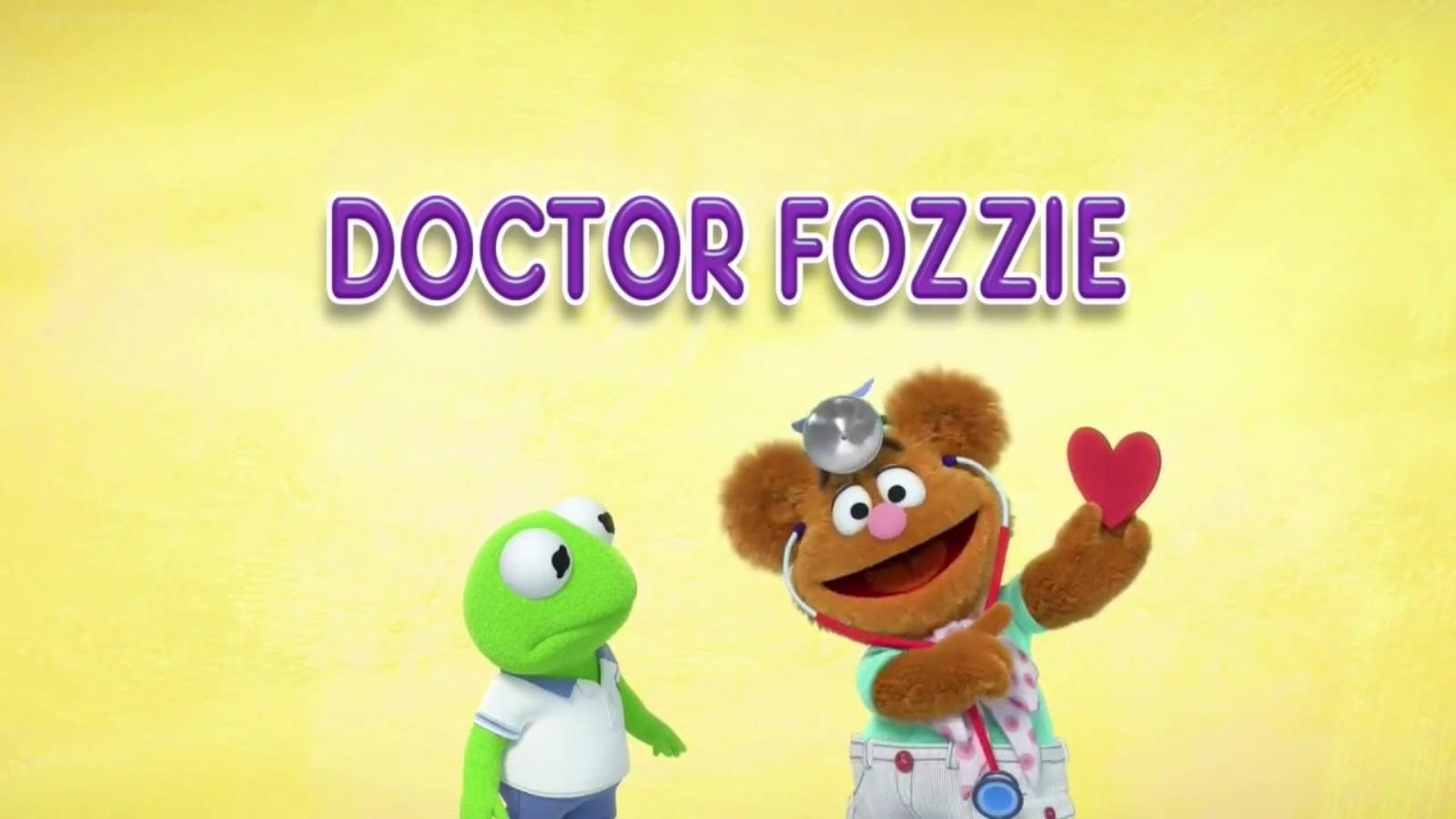 Fozzie Bear 桌布 壁紙 — Doctor Fozzie Bear 手持一個紅色心形，而 Kermit the Frog 在明亮的黃色背景前觀看。