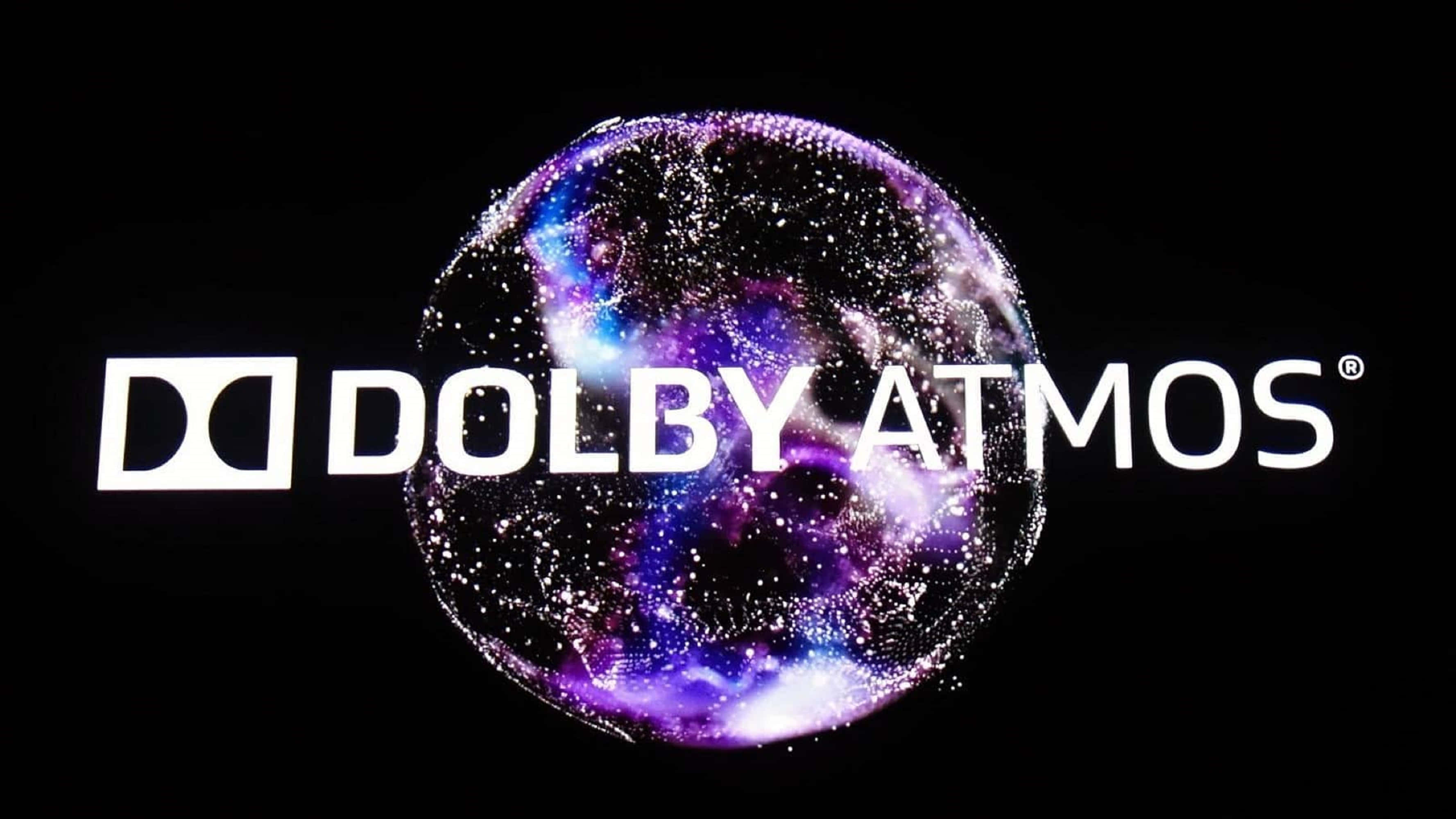 4K Dolby Vision 桌布 壁紙 — Dolby Atmos 標誌，帶有發光宇宙球體，背景為黑色。