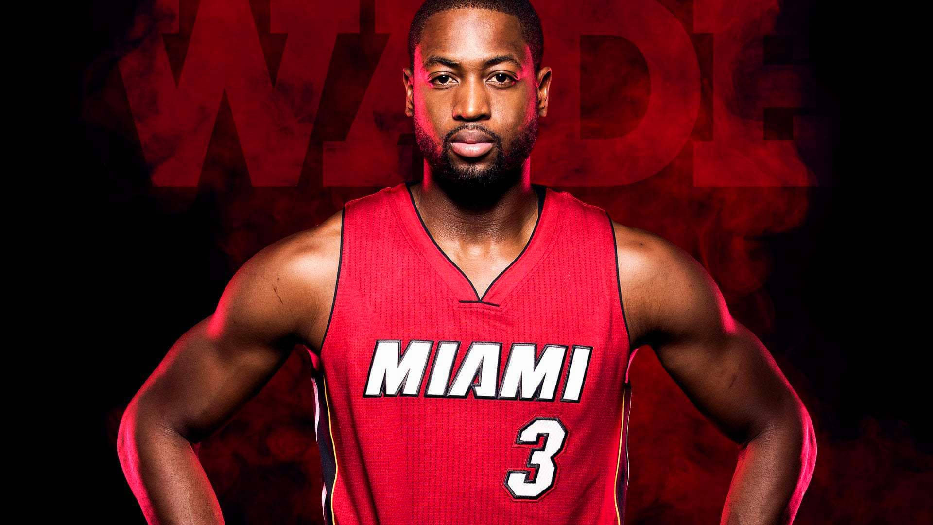 NBA 桌布 壁紙 — Dwyane Wade 身穿紅色邁阿密熱火球衣，雙手叉腰，自信地站在煙霧繚繞的紅色背景前，他的名字以粗體字呈現。