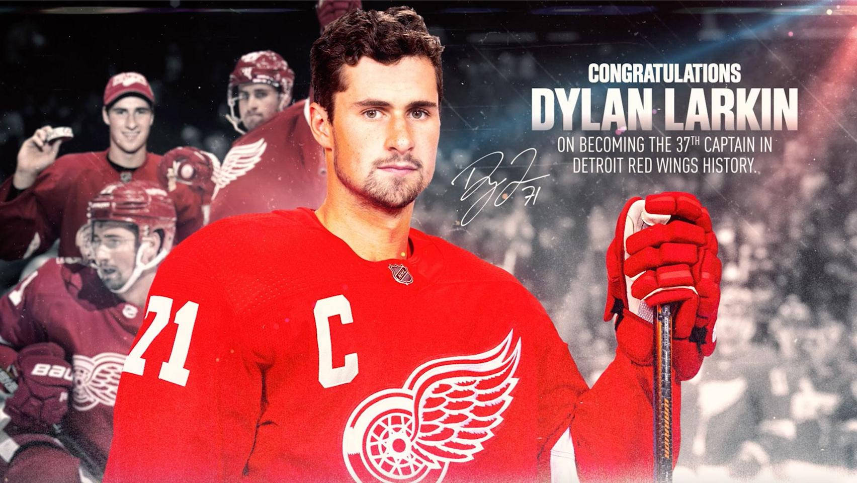 hockey 桌布 壁紙 — Dylan Larkin 身穿紅色底特律紅翼球衣，手持球棍，帶有 'C' 隊長臂章，慶祝他第37次擔任隊長的里程碑。
