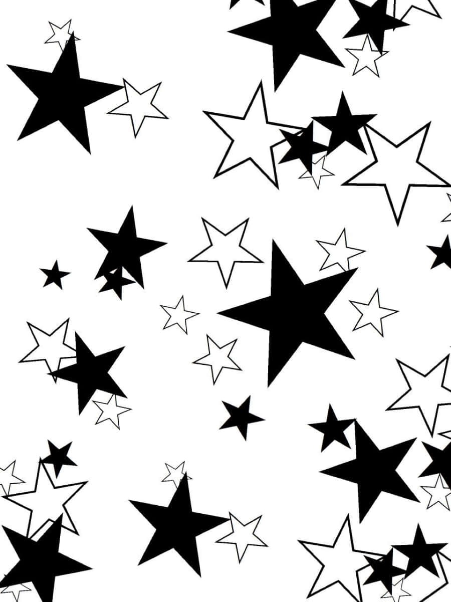 Black And White Star 桌布 壁紙 — 一個動態的黑白圖案，由不同大小和輪廓的星星散落在素色背景上組成。