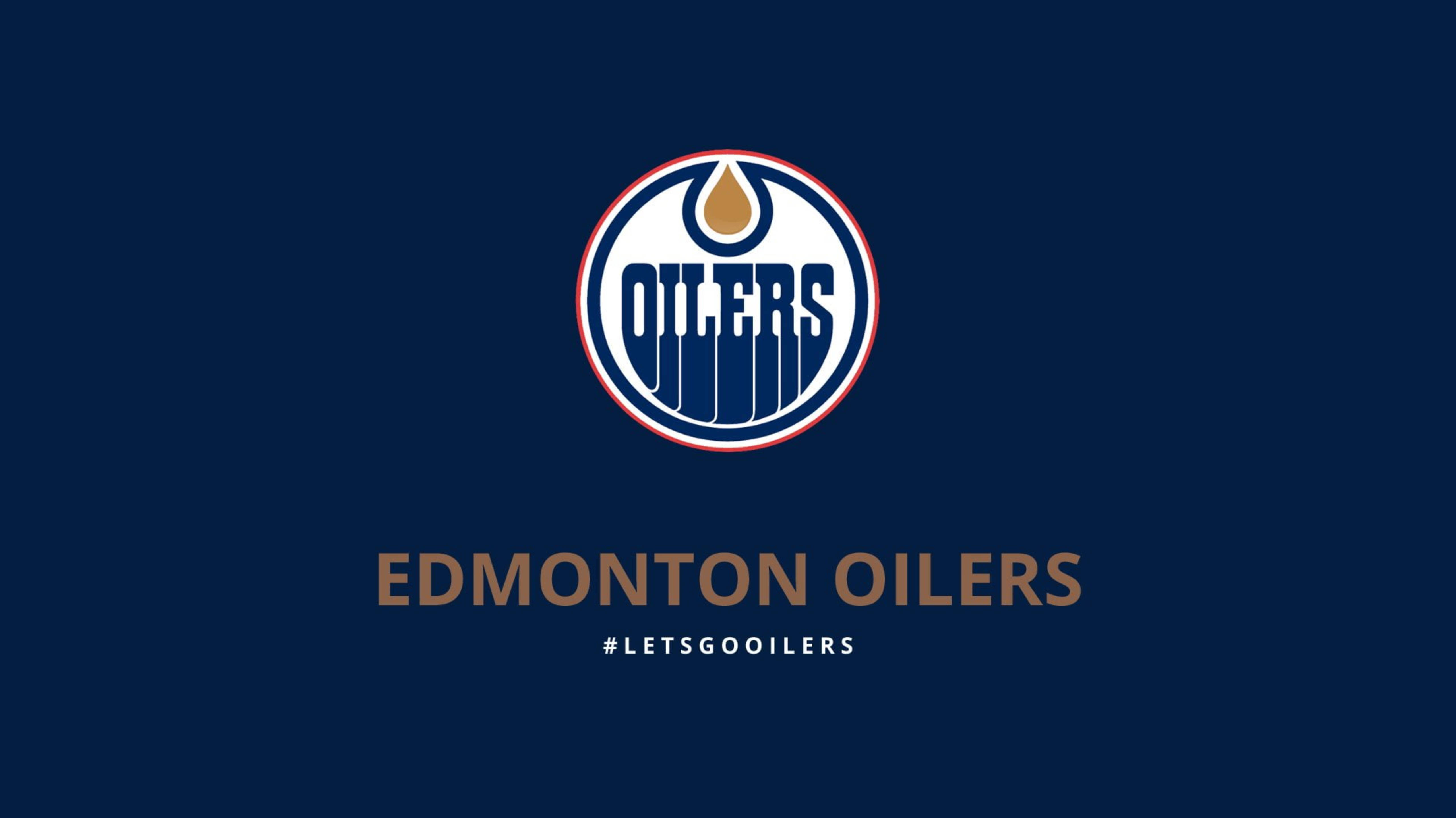 Oilers 桌布 壁紙 — Edmonton Oilers 標誌居中於深藍色背景上，下方有球隊名稱和主題標籤。