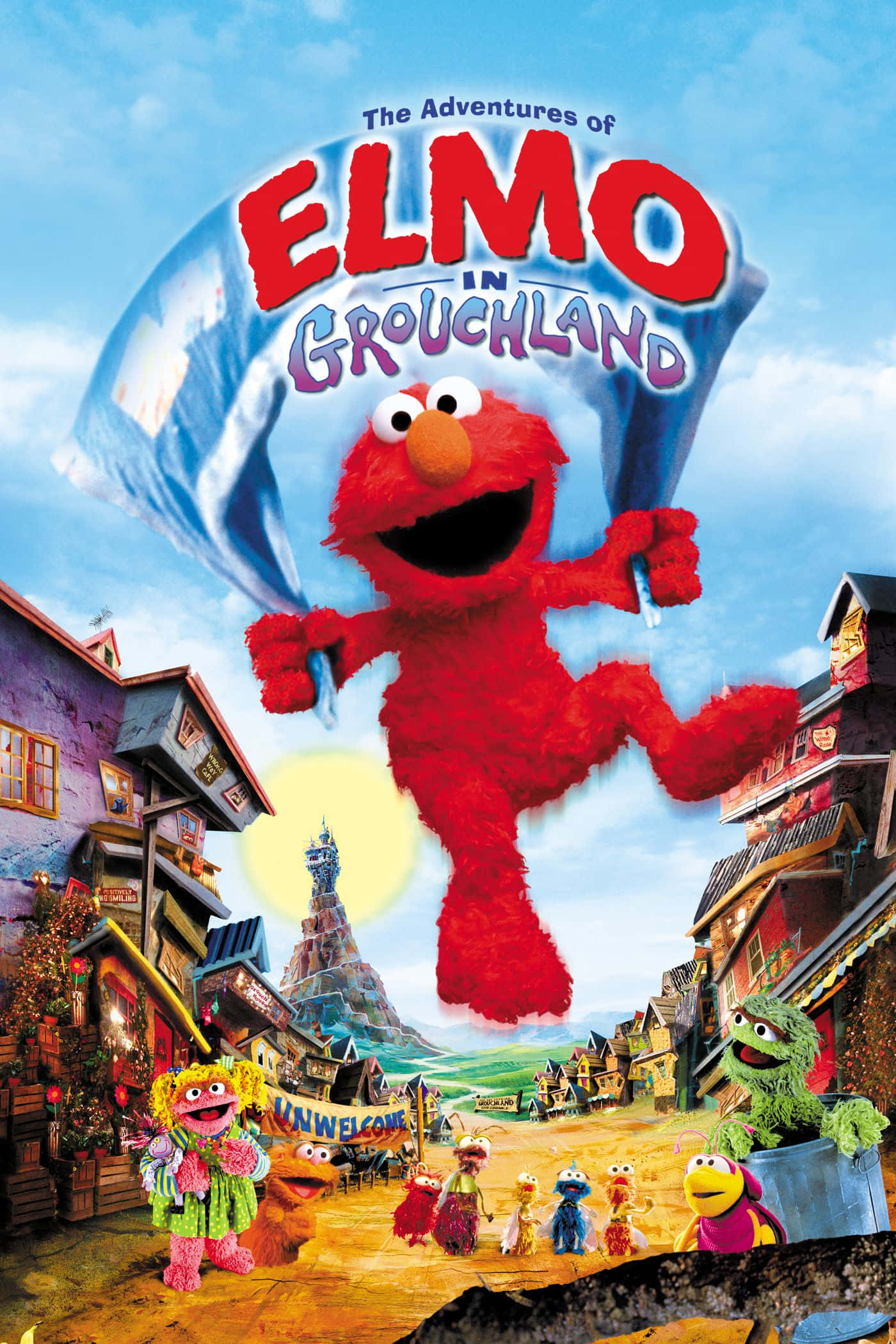Elmo 桌布 壁紙 — Elmo 在明亮的藍天下，快樂地跳過一個充滿芝麻街角色和古怪建築的色彩繽紛小鎮。