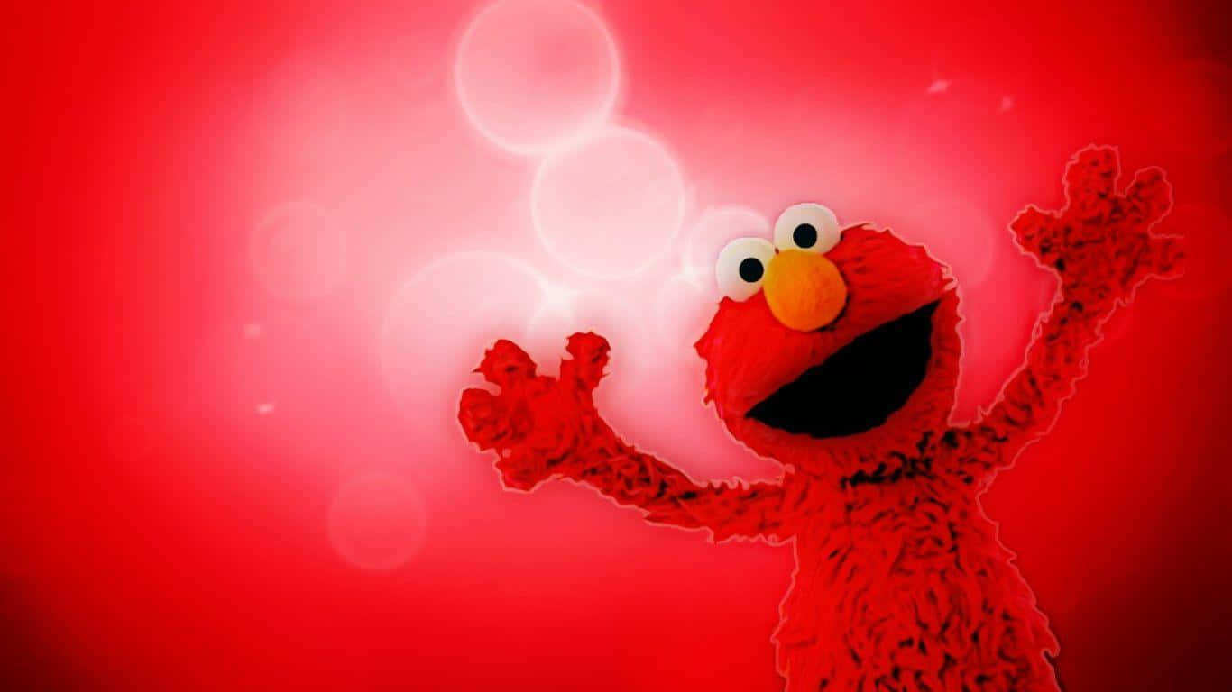 芝麻街 桌布 壁紙 — Elmo 在發光的紅色背景和柔和的白色散景燈光下開心地舉起手臂。