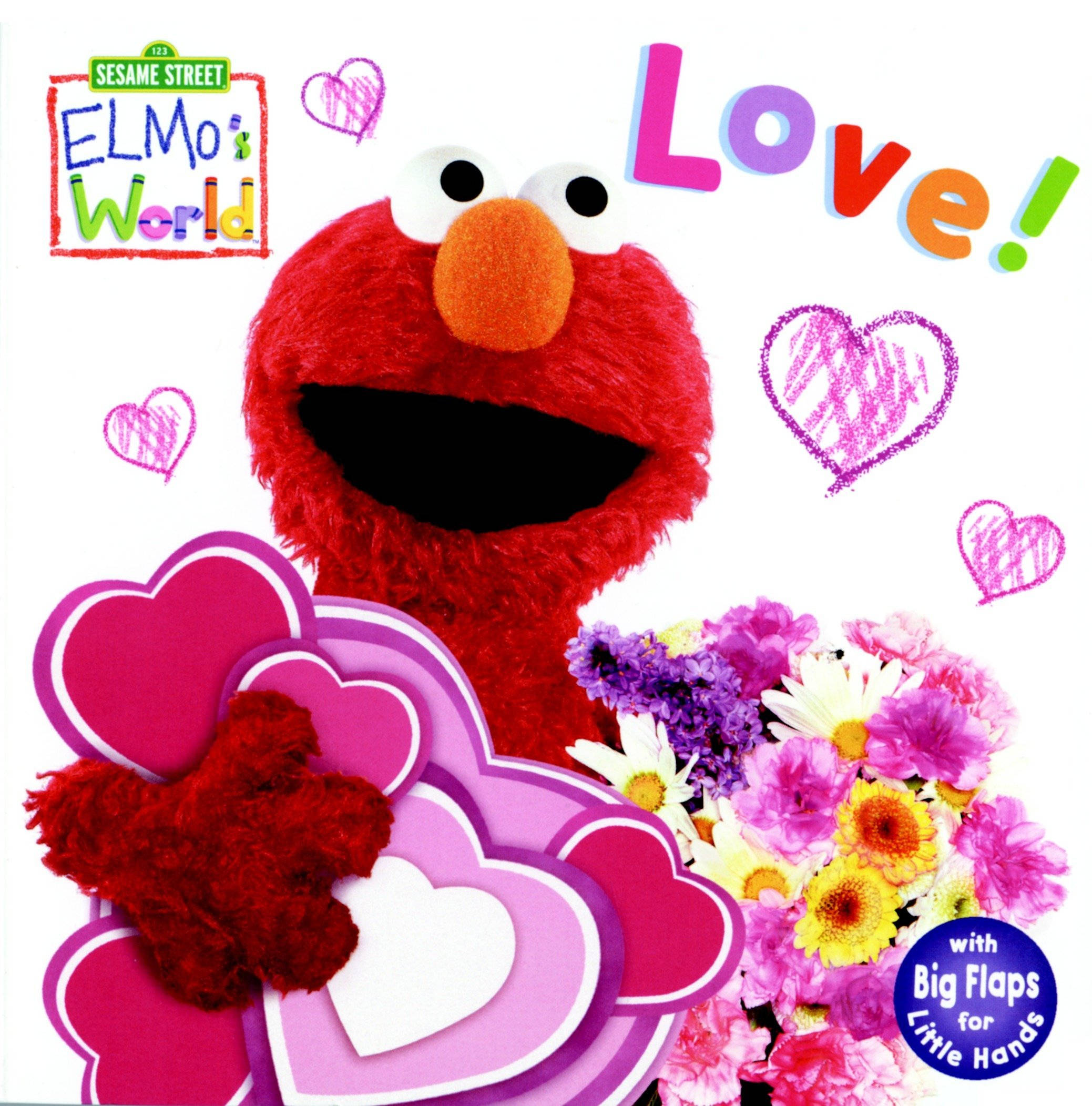 Elmo 桌布 壁紙 — Elmo 在白色背景上燦爛微笑，手持心形和花朵，並有色彩繽紛的「Love!」文字。