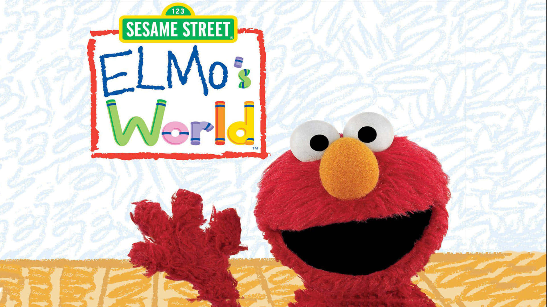 Elmo 桌布 壁紙 — Elmo 在芝麻街開心地揮手，身後有個色彩繽紛的「Elmo's World」標誌。