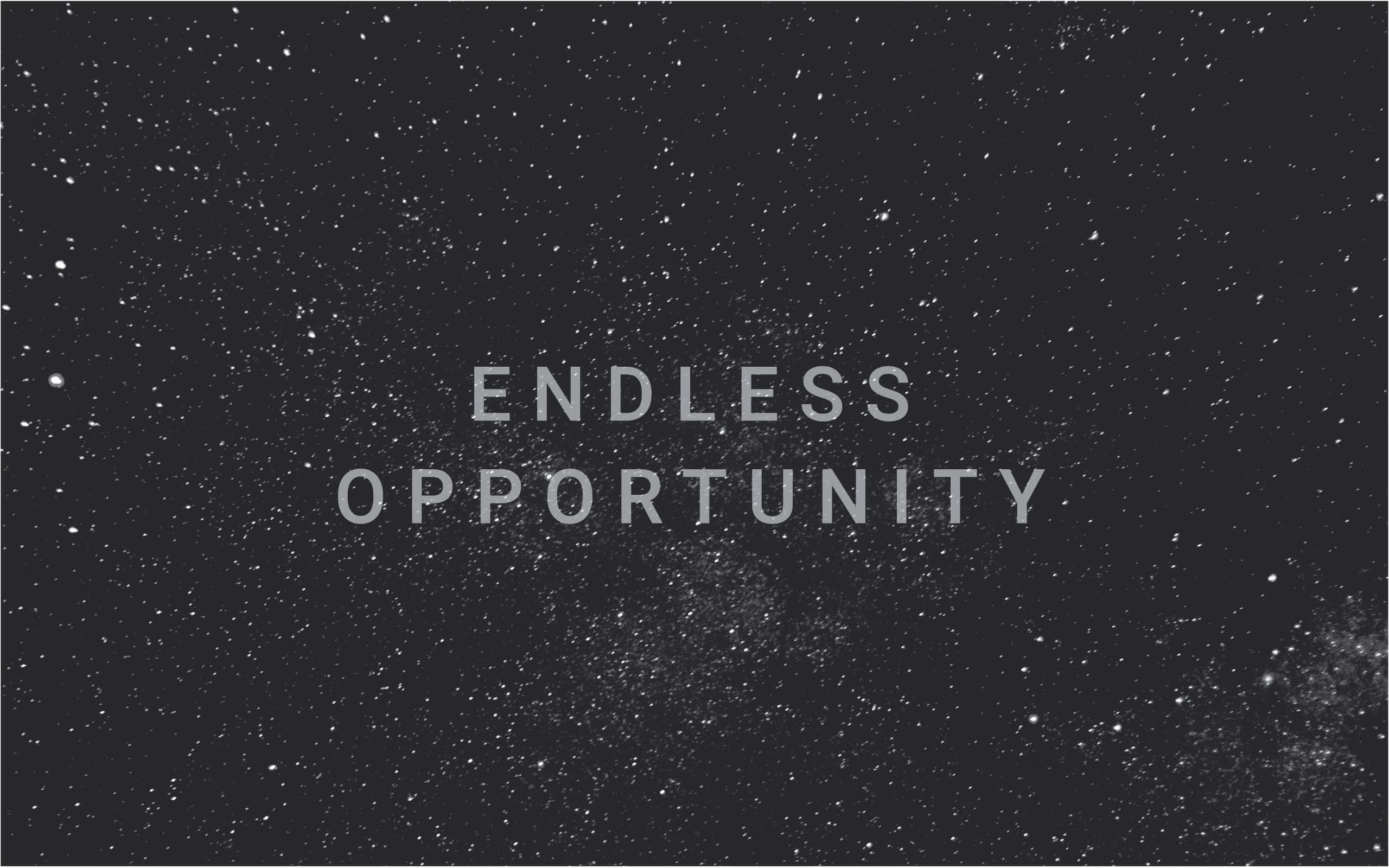Starry Sky 桌布 壁紙 — 「endless opportunity」這個短語在黑暗星空背景上以淺灰色發光，背景佈滿散落的宇宙斑點。