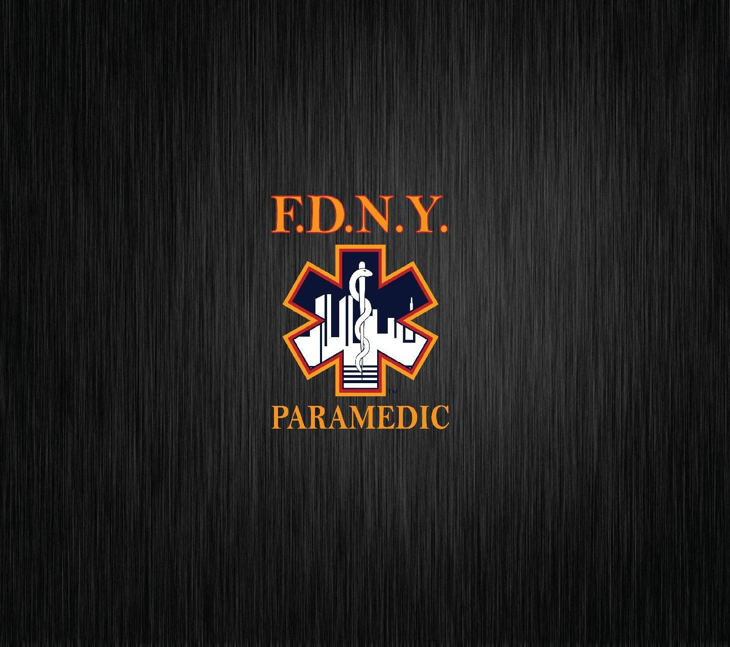 Work 桌布 壁紙 — F.D.N.Y. 救護員標誌，橙色和藍色，深色拉絲金屬背景。