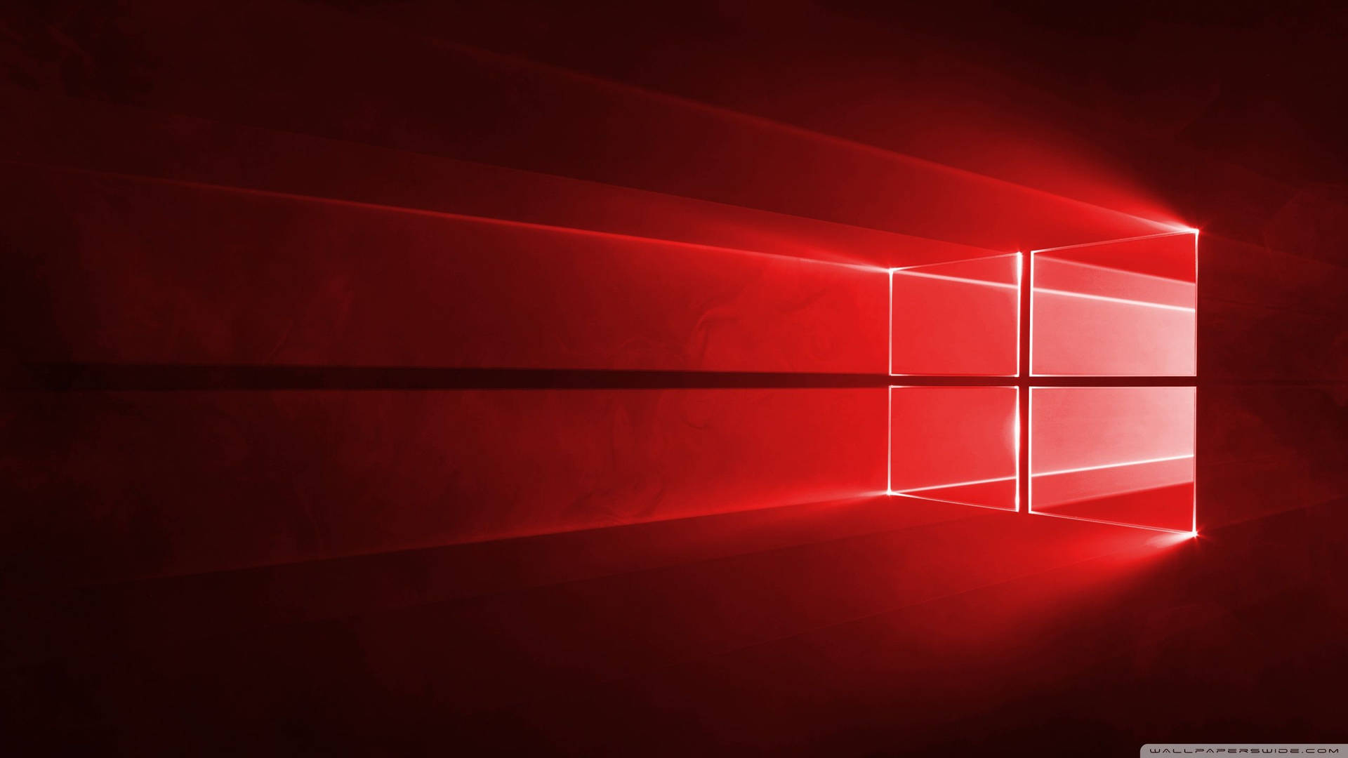 紅色發光視窗標誌，在黑暗抽象數位背景中帶有光束。 — Windows 11 壁紙