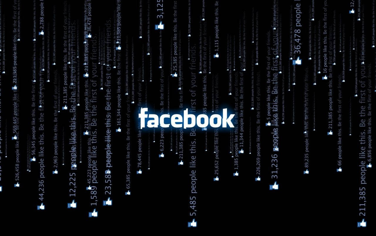 Facebook 桌布 壁紙 — Facebook 標誌在黑色背景上發出白色光芒，帶有掉落的讚好通知和數字。